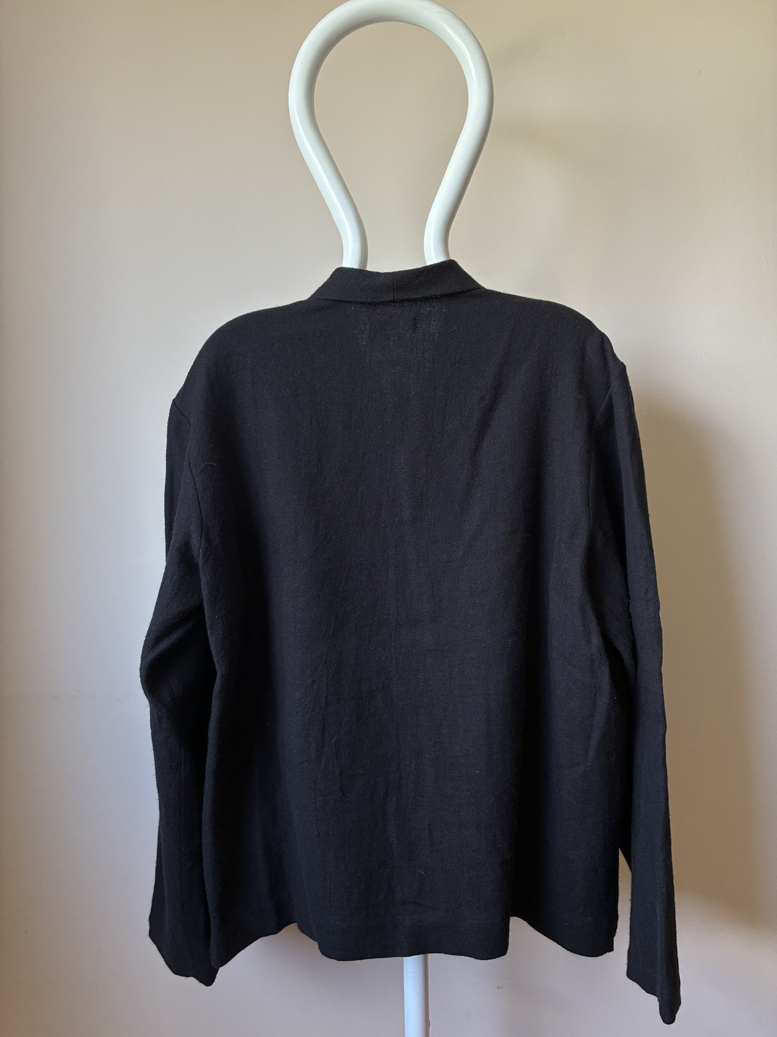 Back of Frank Leder Black Wool Shirt Jacket on mannequin