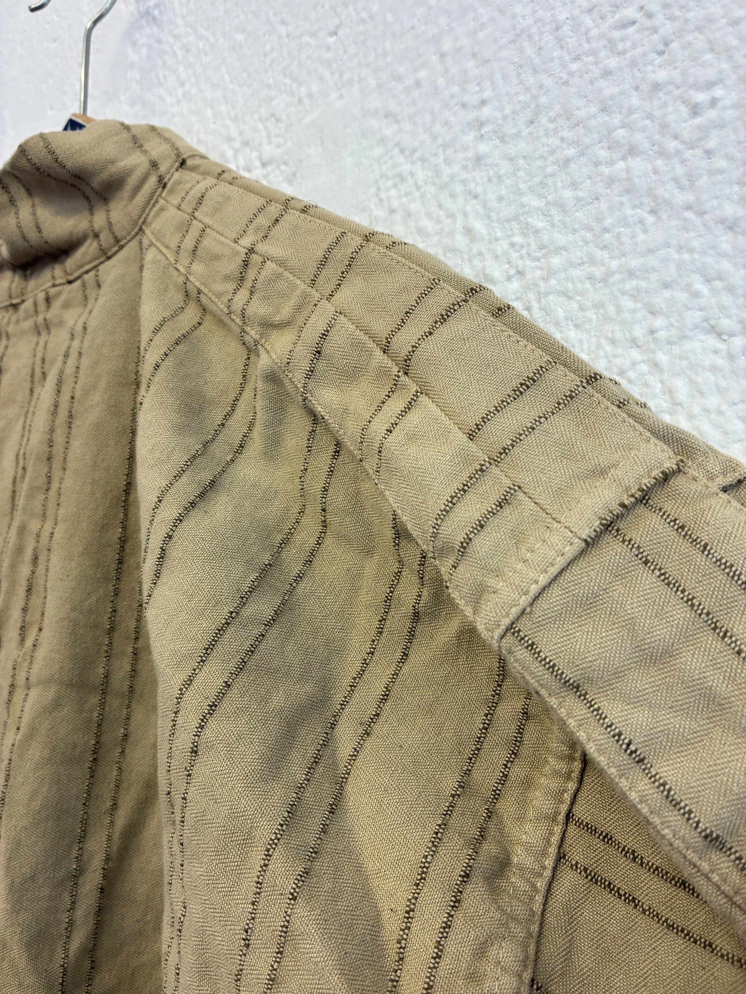 Closeup of shoulder of Drab Weld Tender Co Type 485 Isosceles Shirt