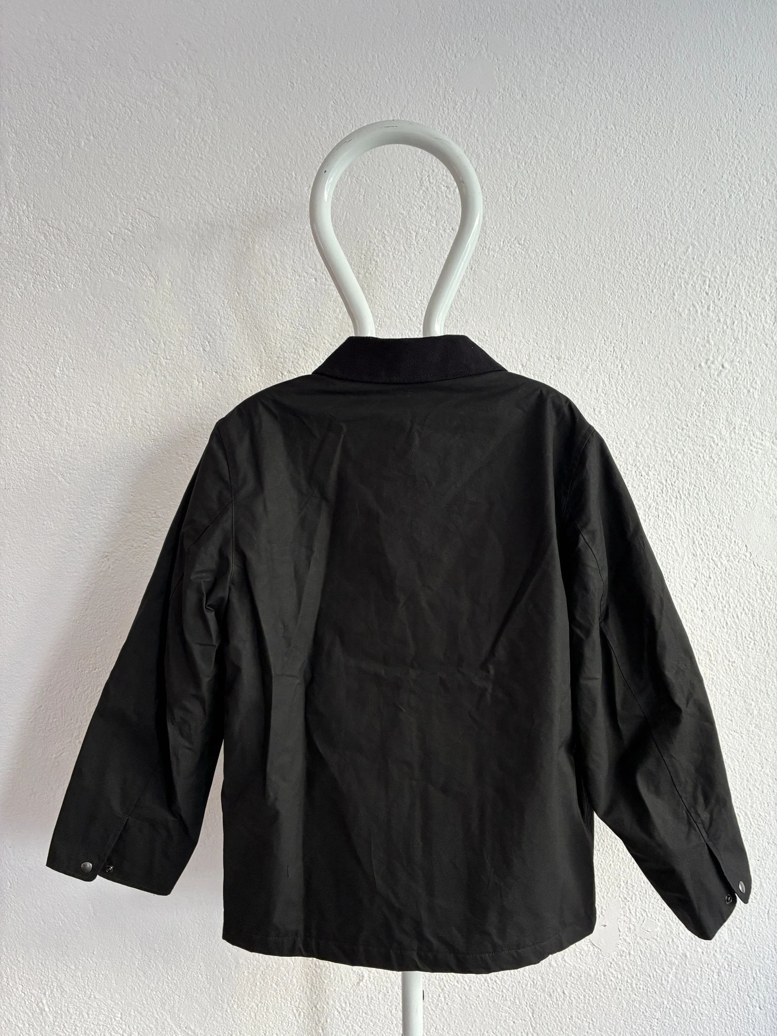 Back of Black Conkers Blanket Jacket on mannequin