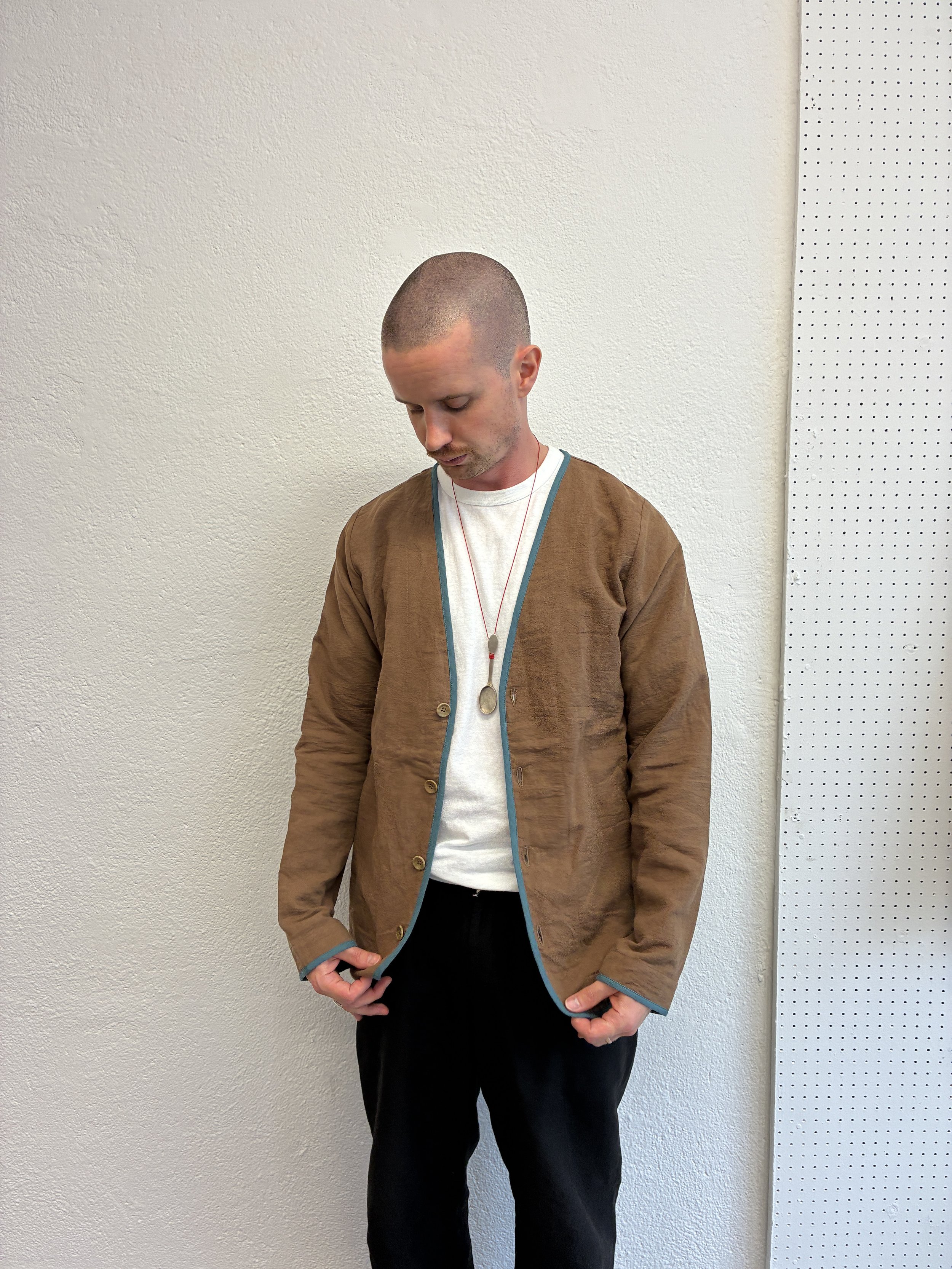 Man wearing Brown Teal Frank Leder Linen Cotton Jacket over white t shirt