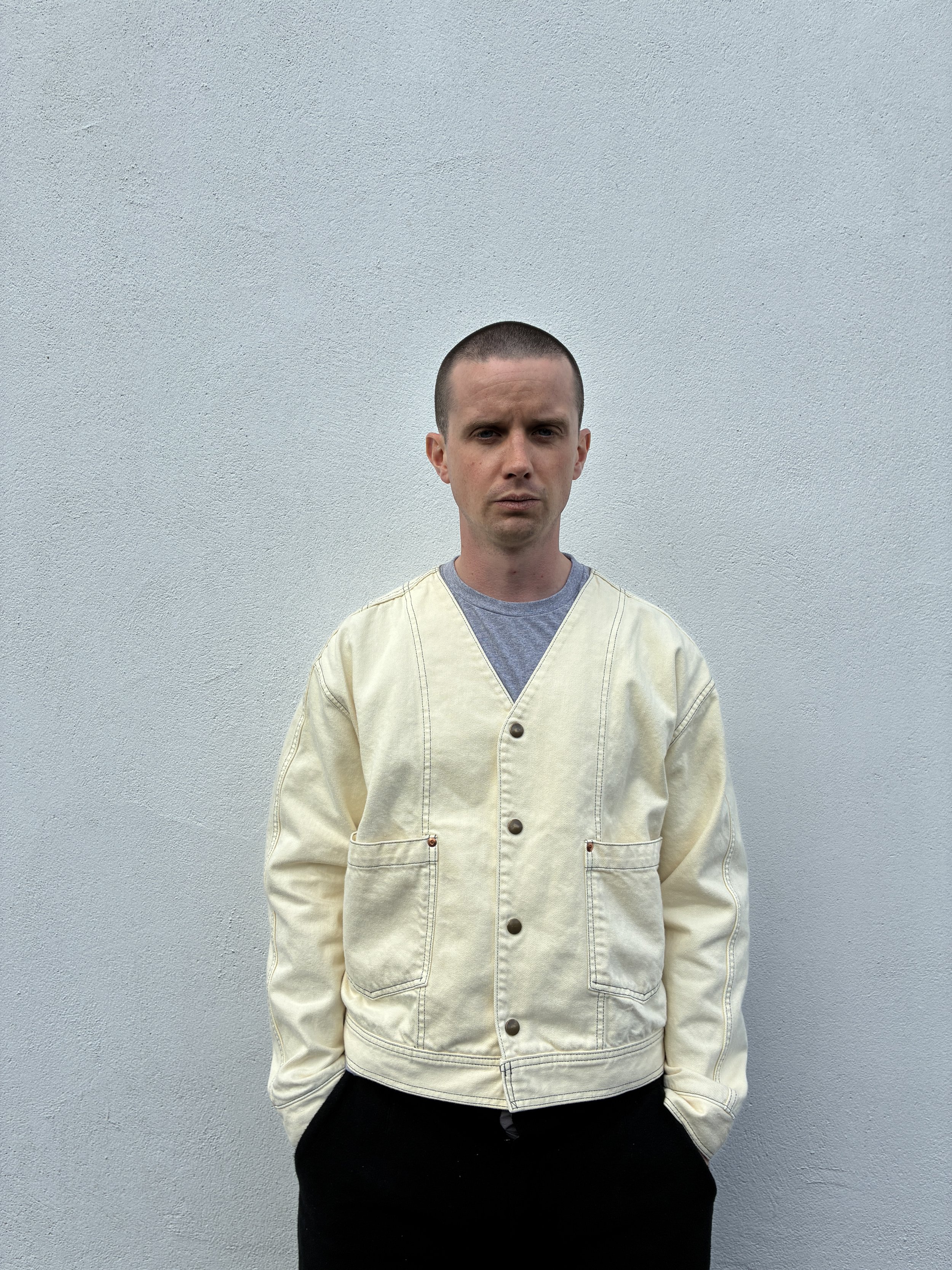 Closeup of man wearing Working Skewed yeast jacket