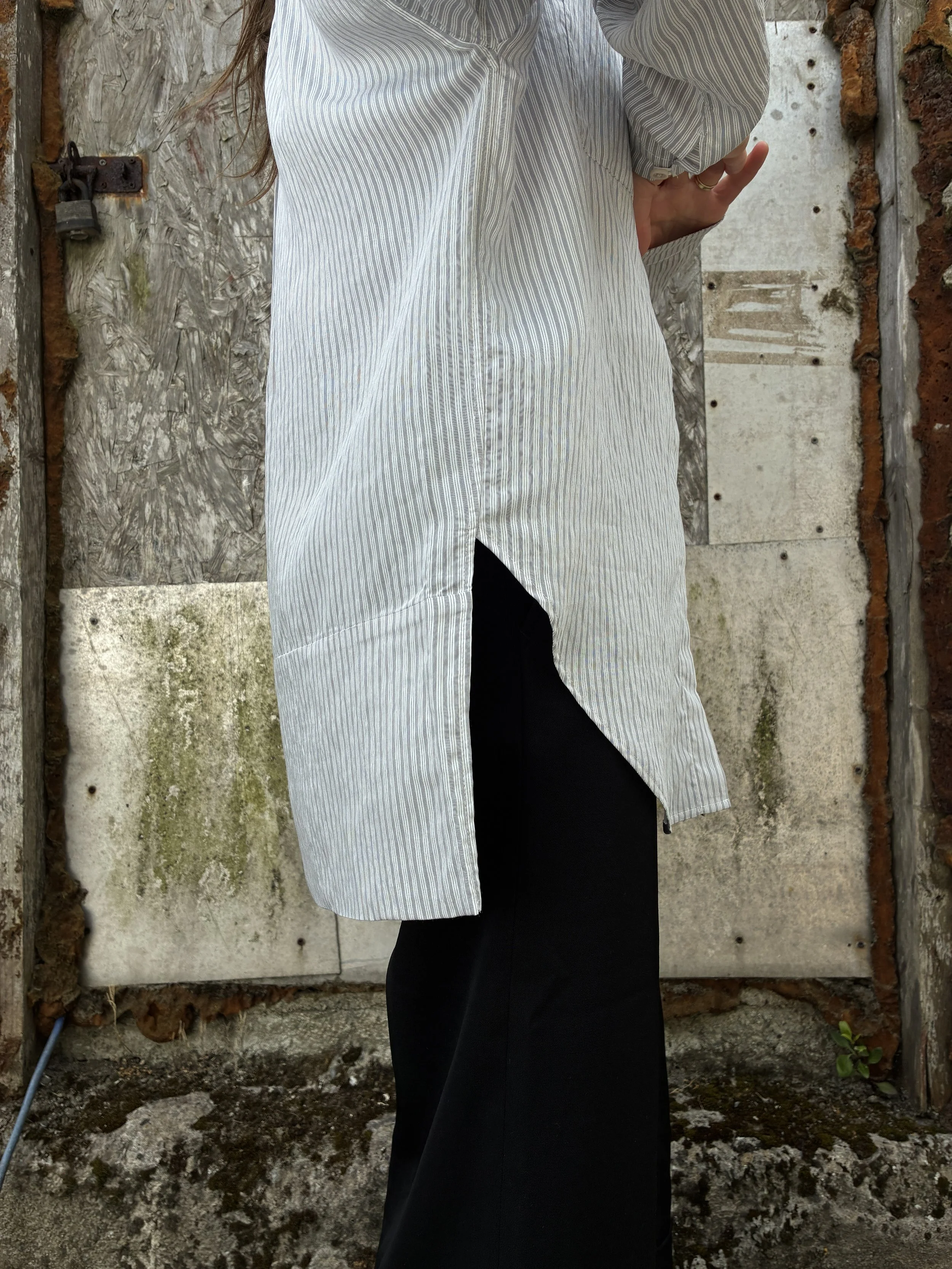 Closeup of side of 1st PAT-RN Woman Modula Shirt in Fine Stripes modelled on woman