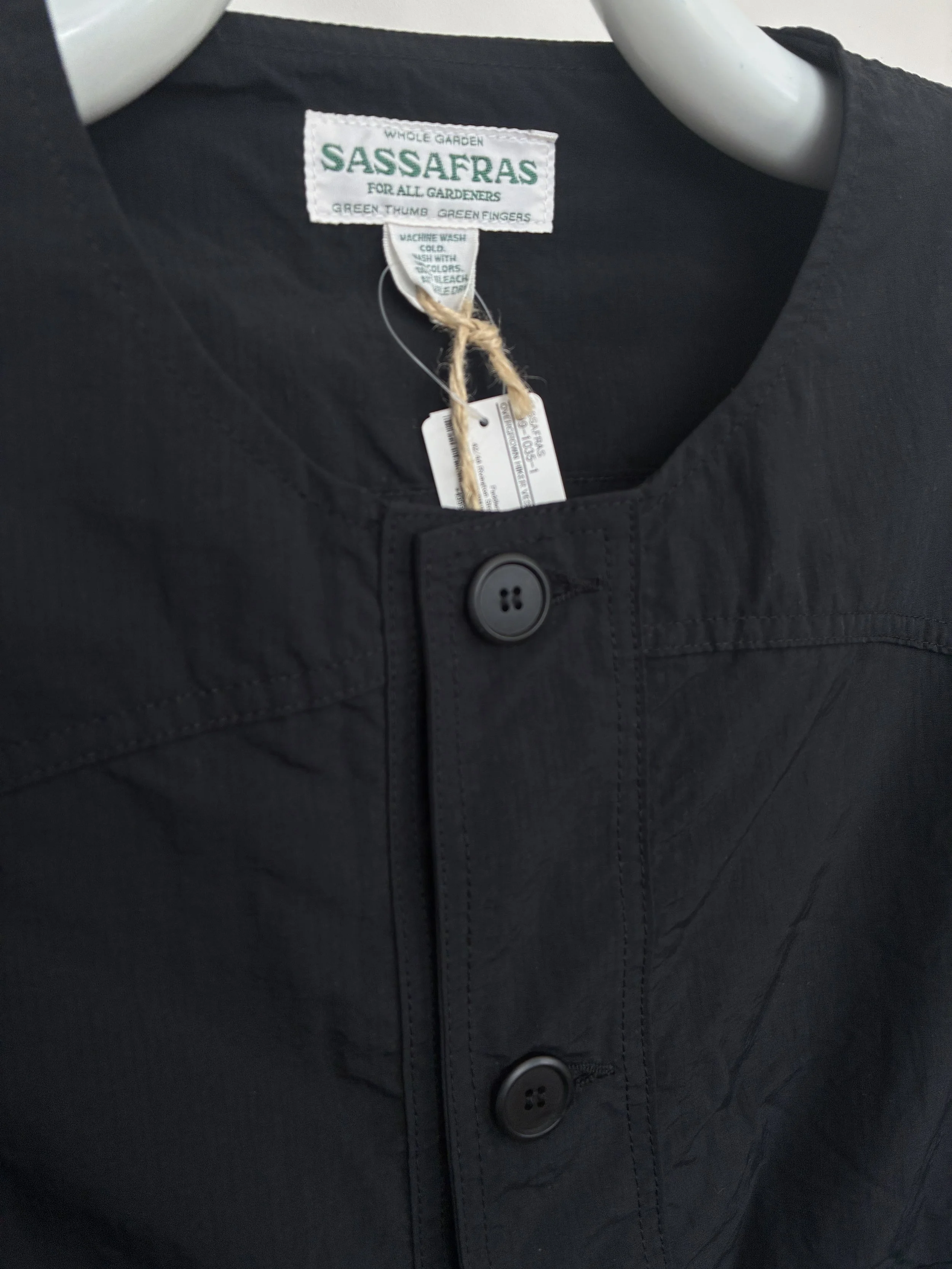 Closeup of collar of Black Sassafras Overgrown Hiker Vest