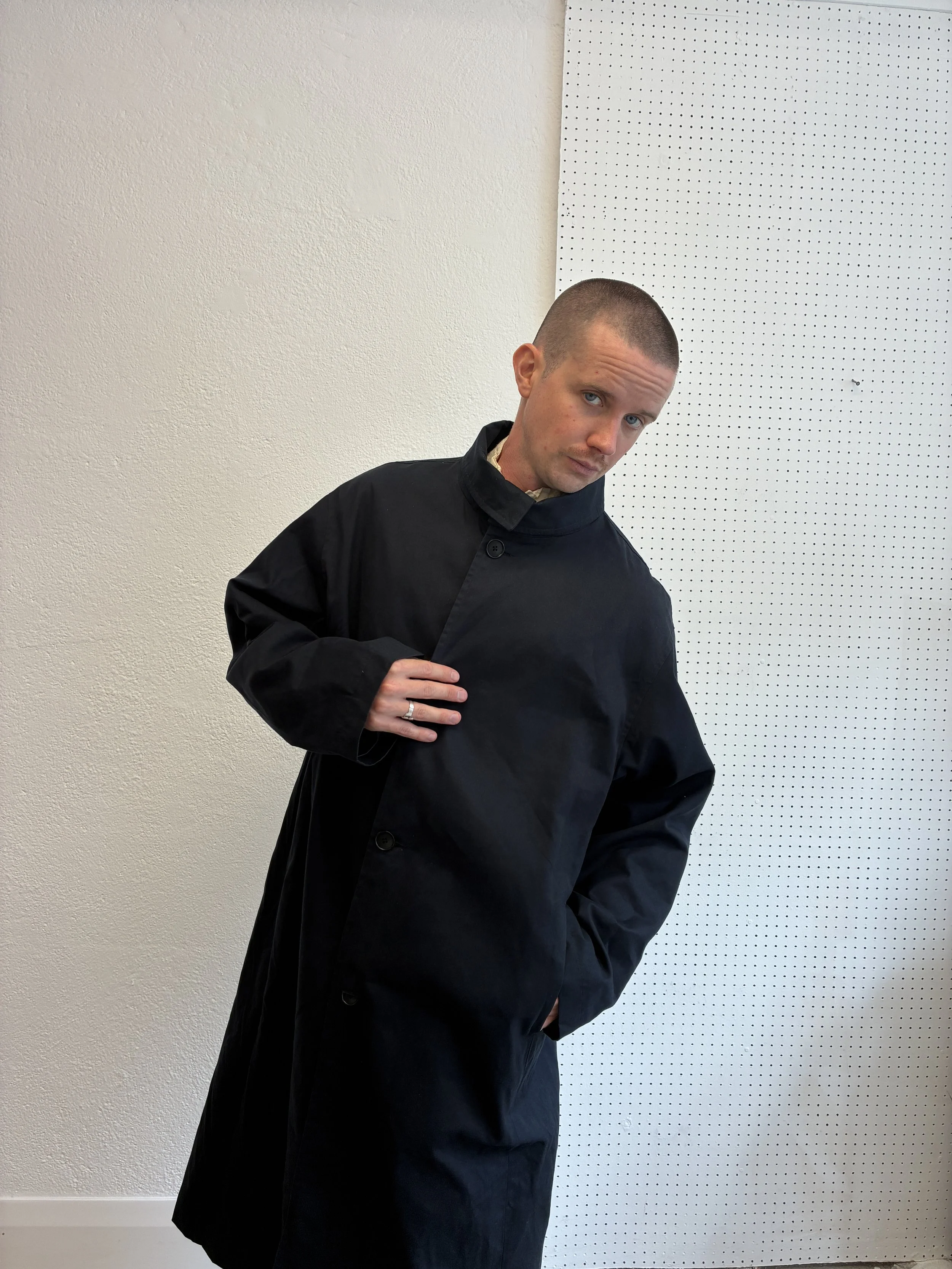 Man posing in Navy De Dam Foundation Cotton Gabardine Trench Coat