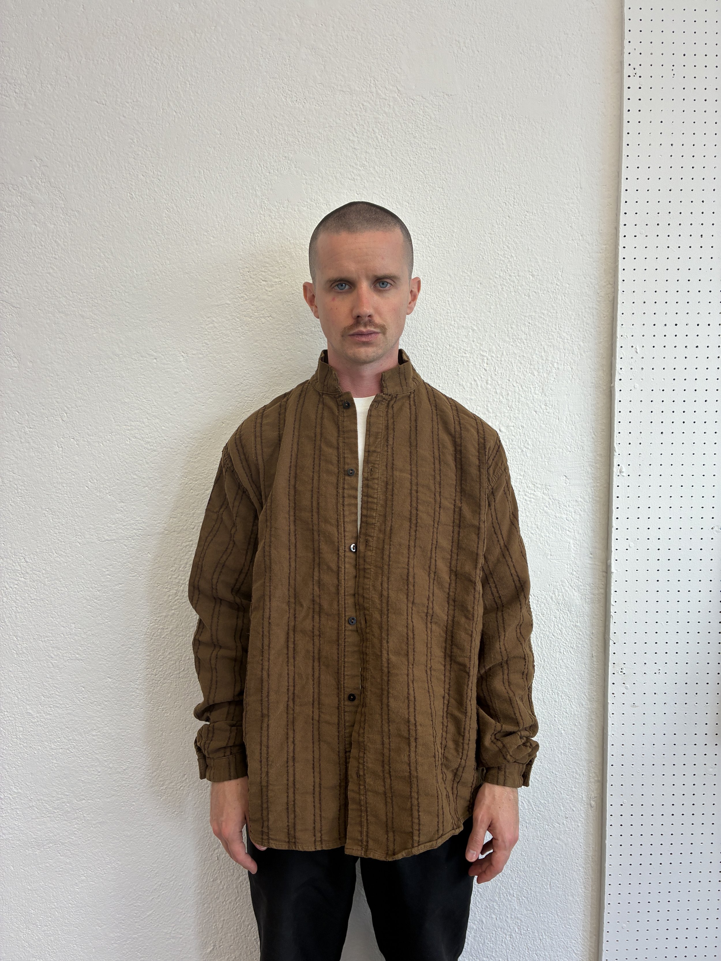 Man wearing Brown Tender Co Type 486 Burro Shirt over white tshirt