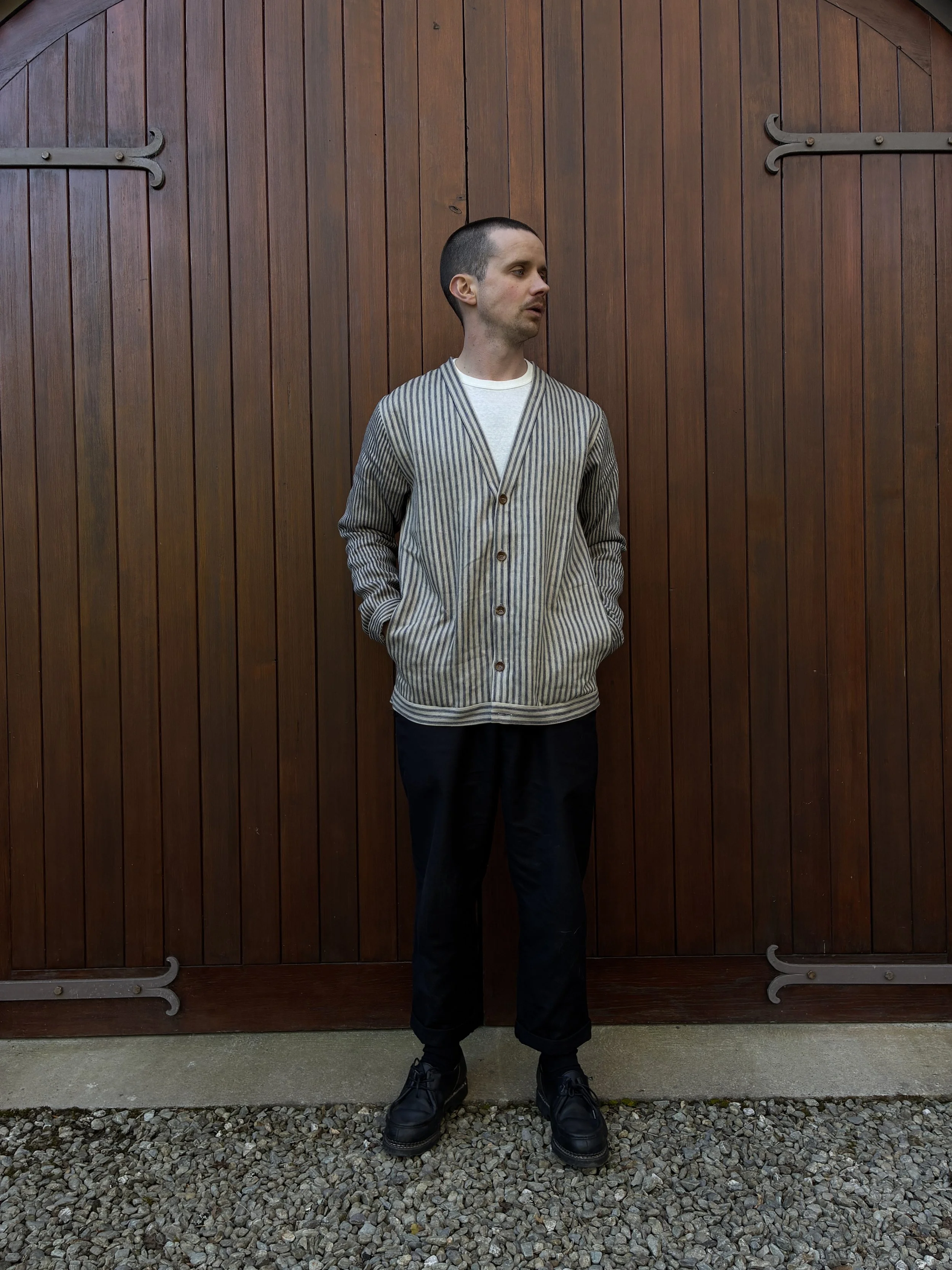 Man with hands in pockets in Frank Leder Striped Linen Cardigan Jacket