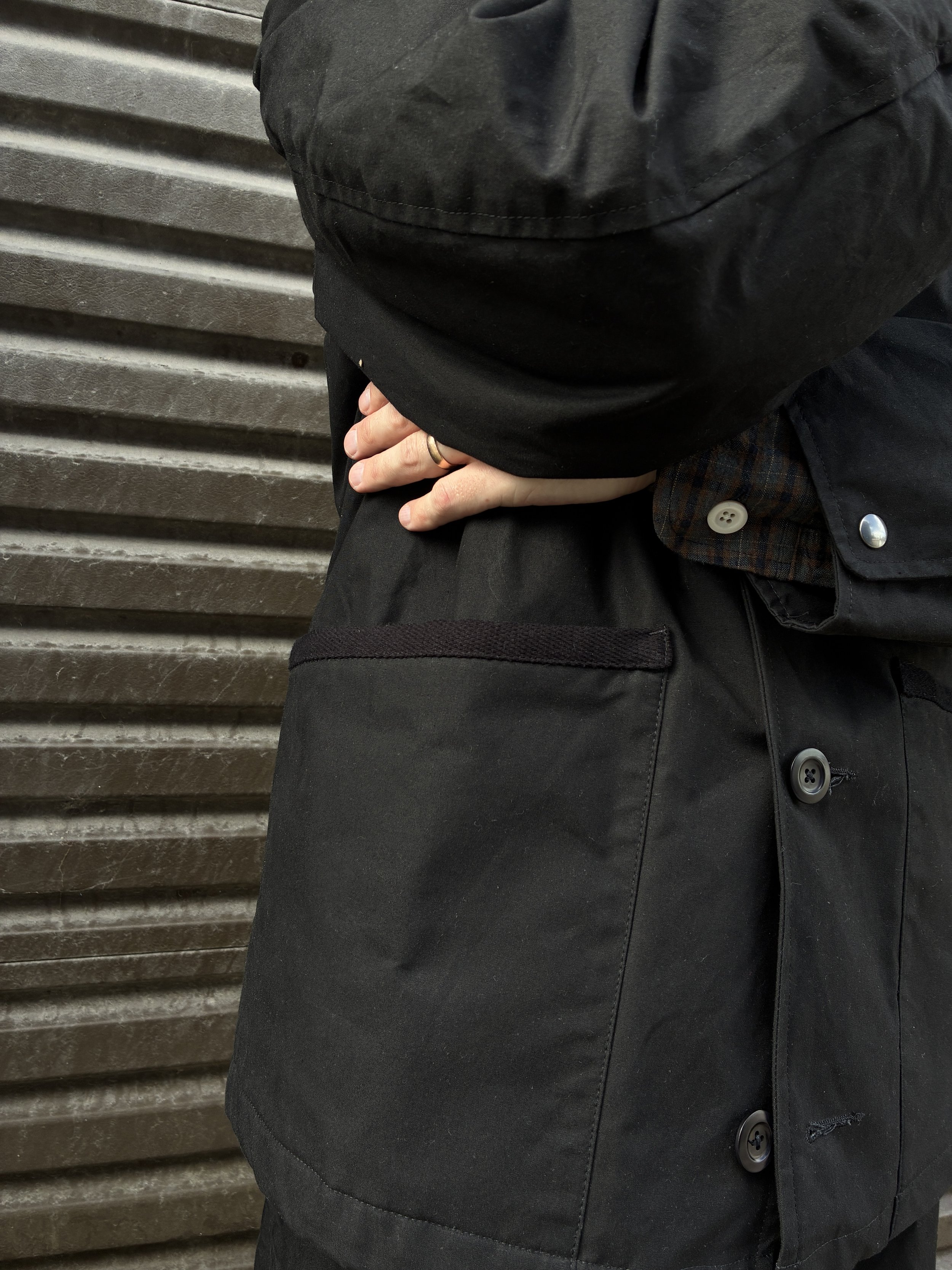 Closeup of pocket of Black Conkers Blanket Jacket