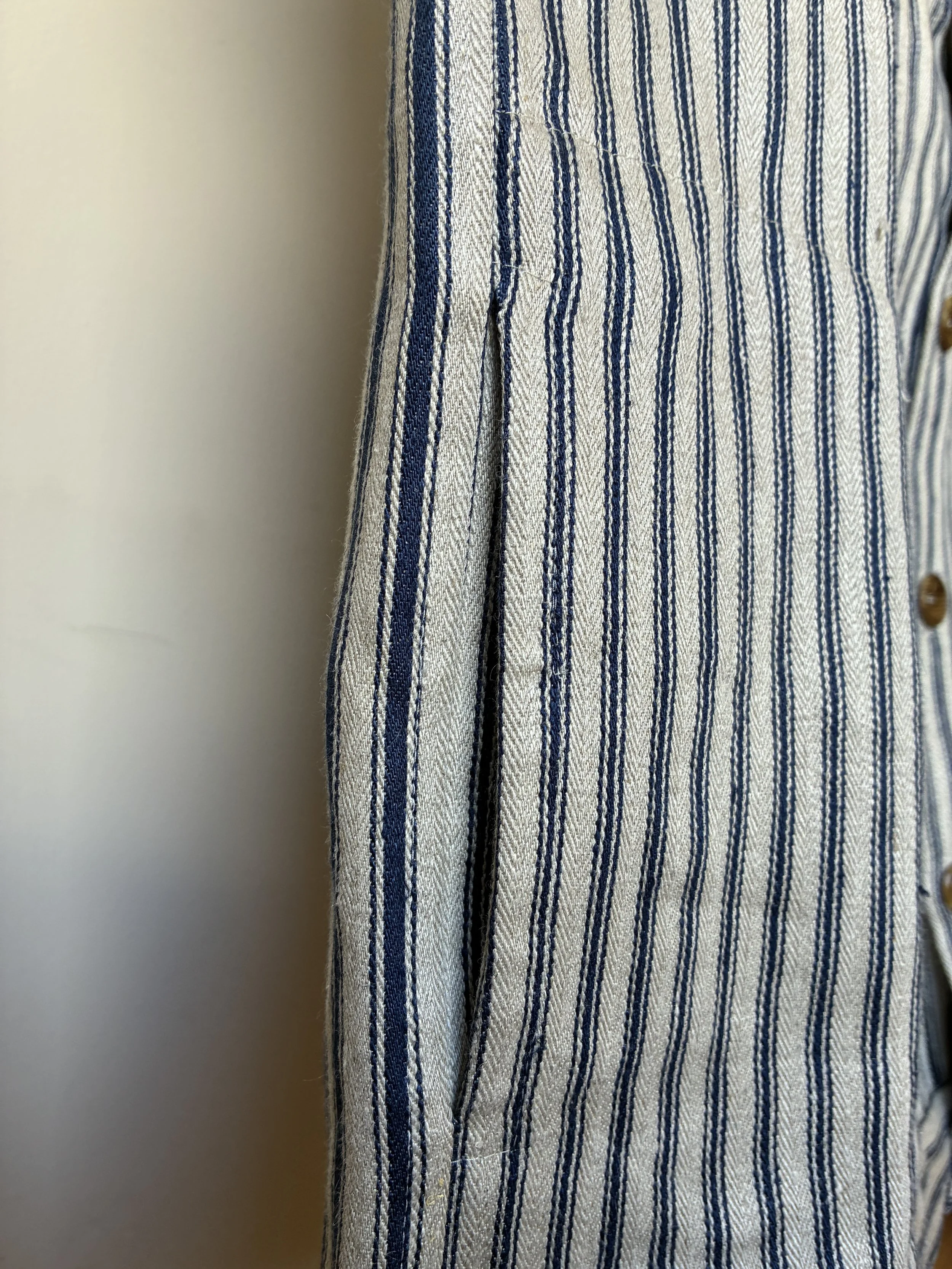 Closeup of pockets of Frank Leder Striped Linen Cardigan Jacket