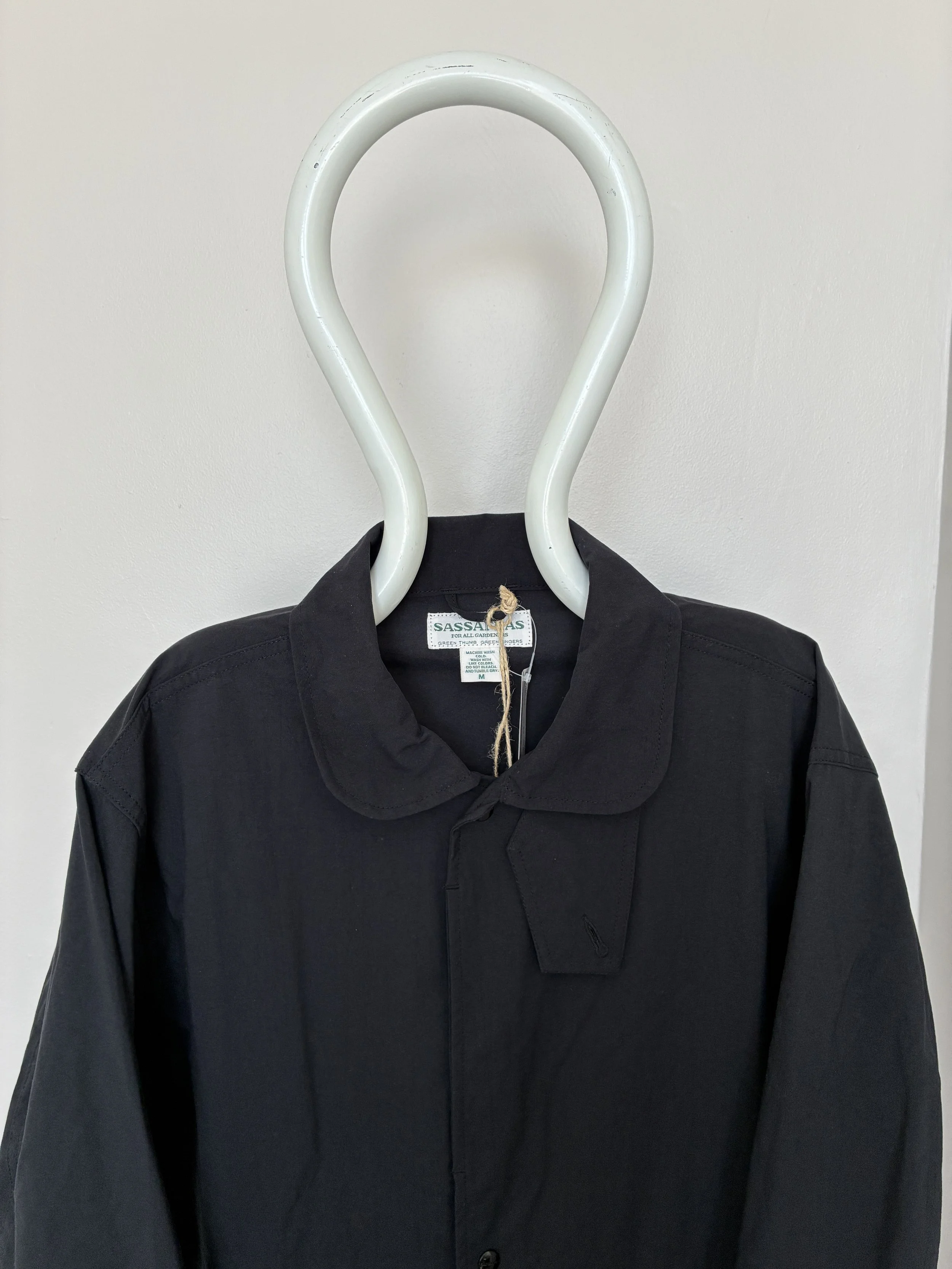 Closeup of Black Sassafras Cultivator Coat on mannequin