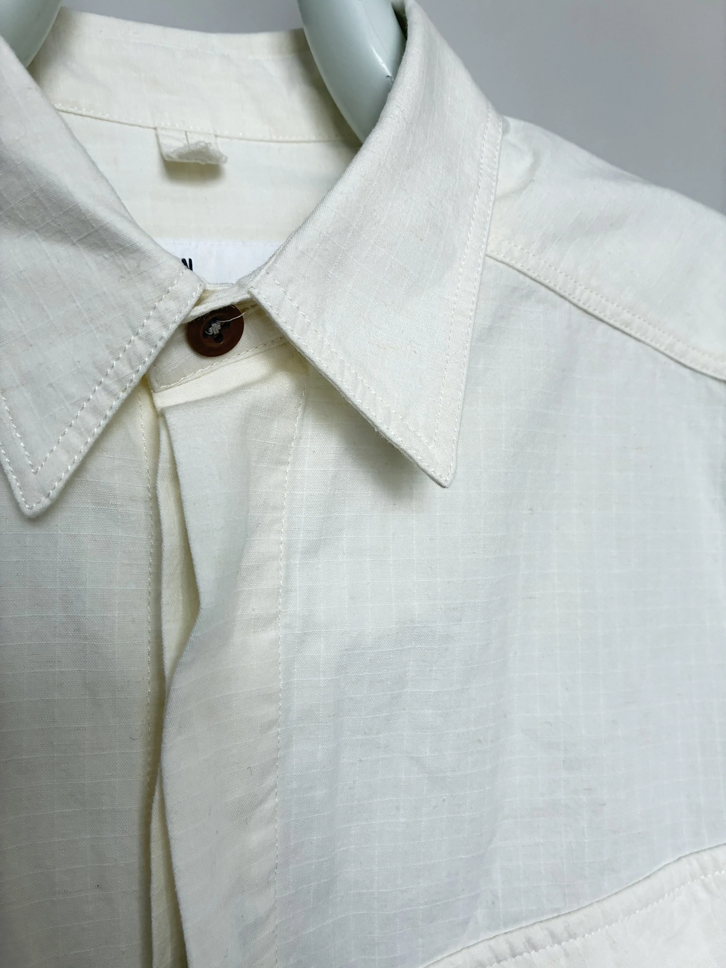 Closeup of collar of Off-White Ecru 1st PAT-RN Sumatra Overshirt on mannequin