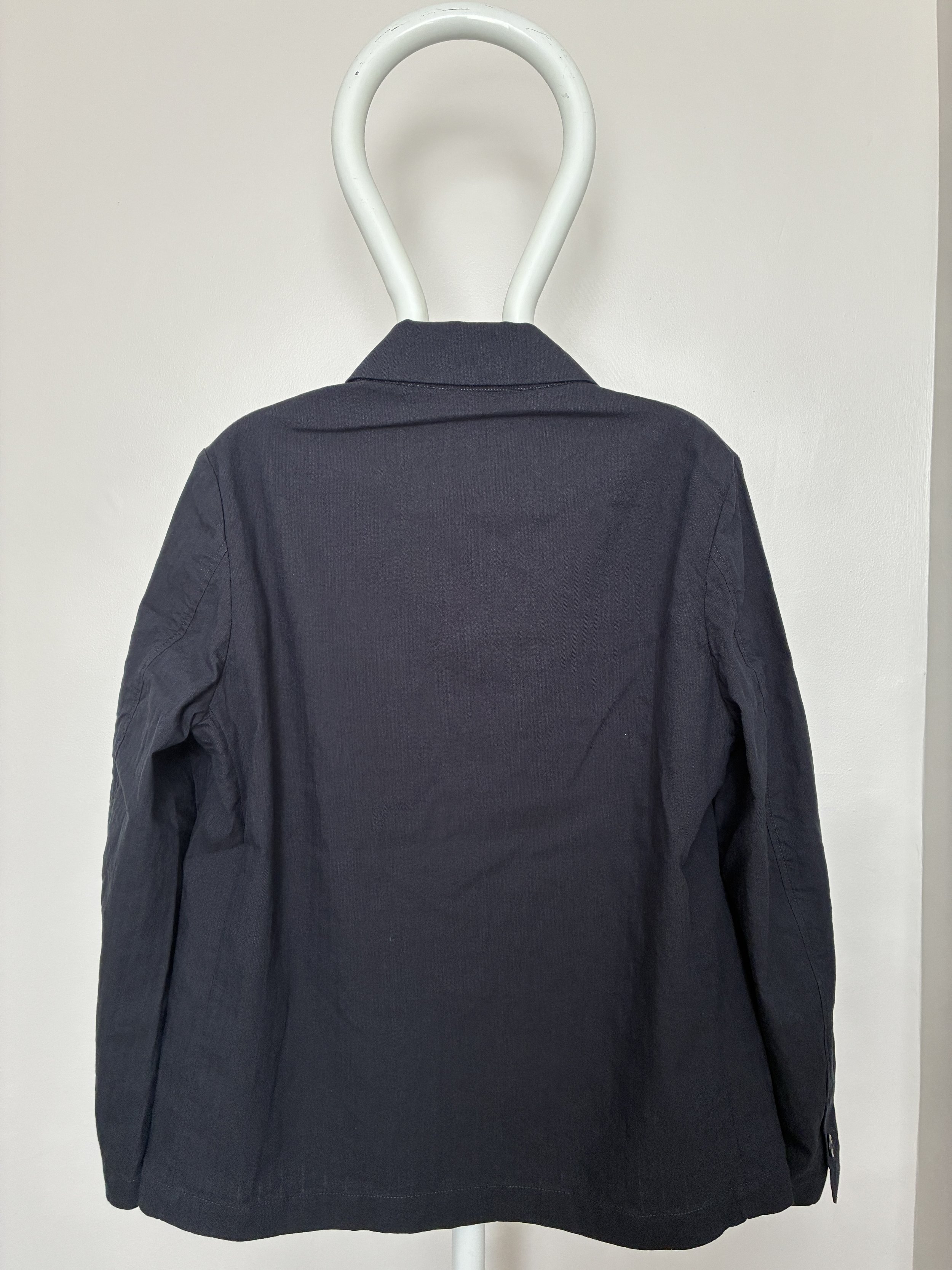 Back of 1st PT-RN Navy Notion Jacket on mannequin
