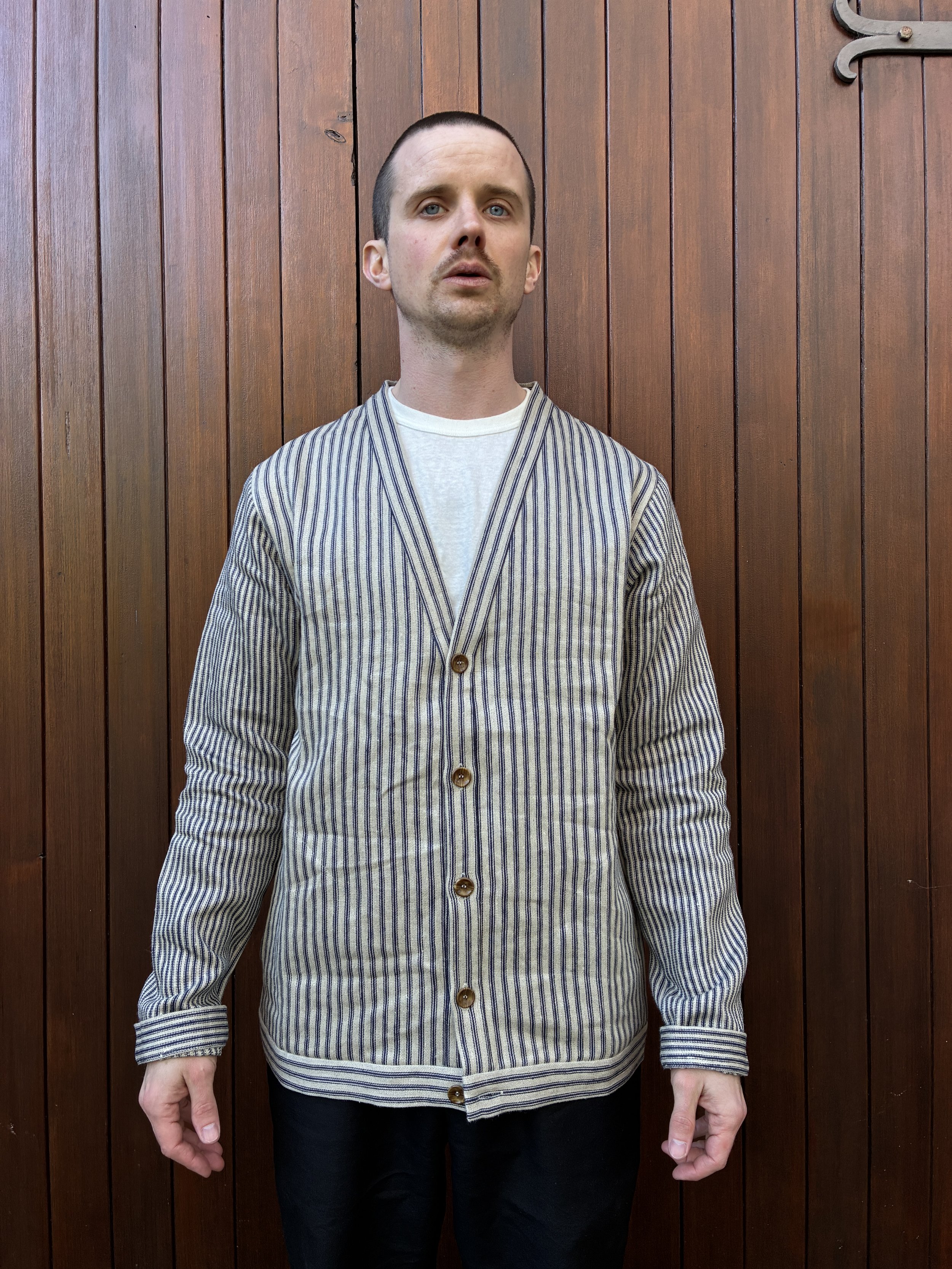Close up of Man wearing Frank Leder Striped Linen Cardigan Jacket outside