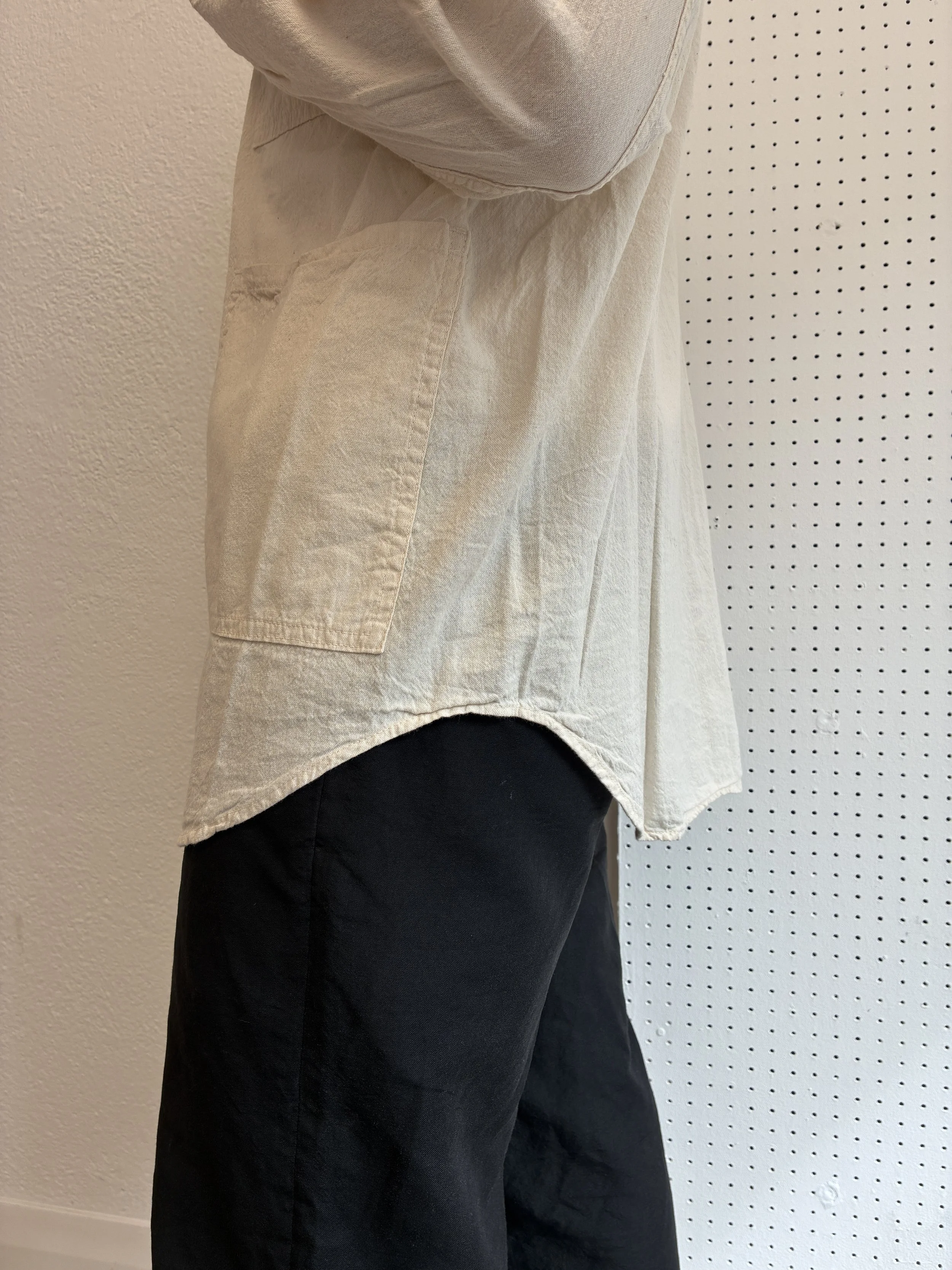 Side of man wearing Tender Co Type 457 ecru rinsed Frock Shirt