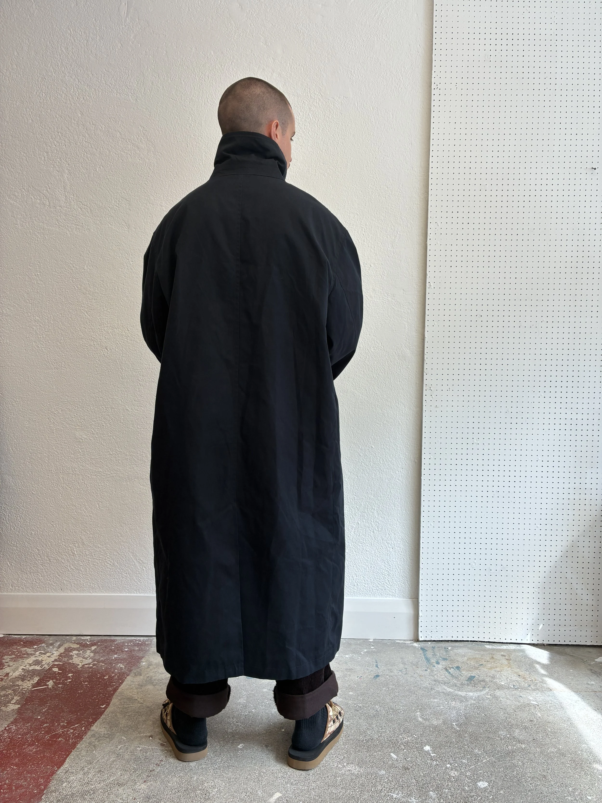 Back of man wearing Navy De Dam Foundation Cotton Gabardine Trench Coat