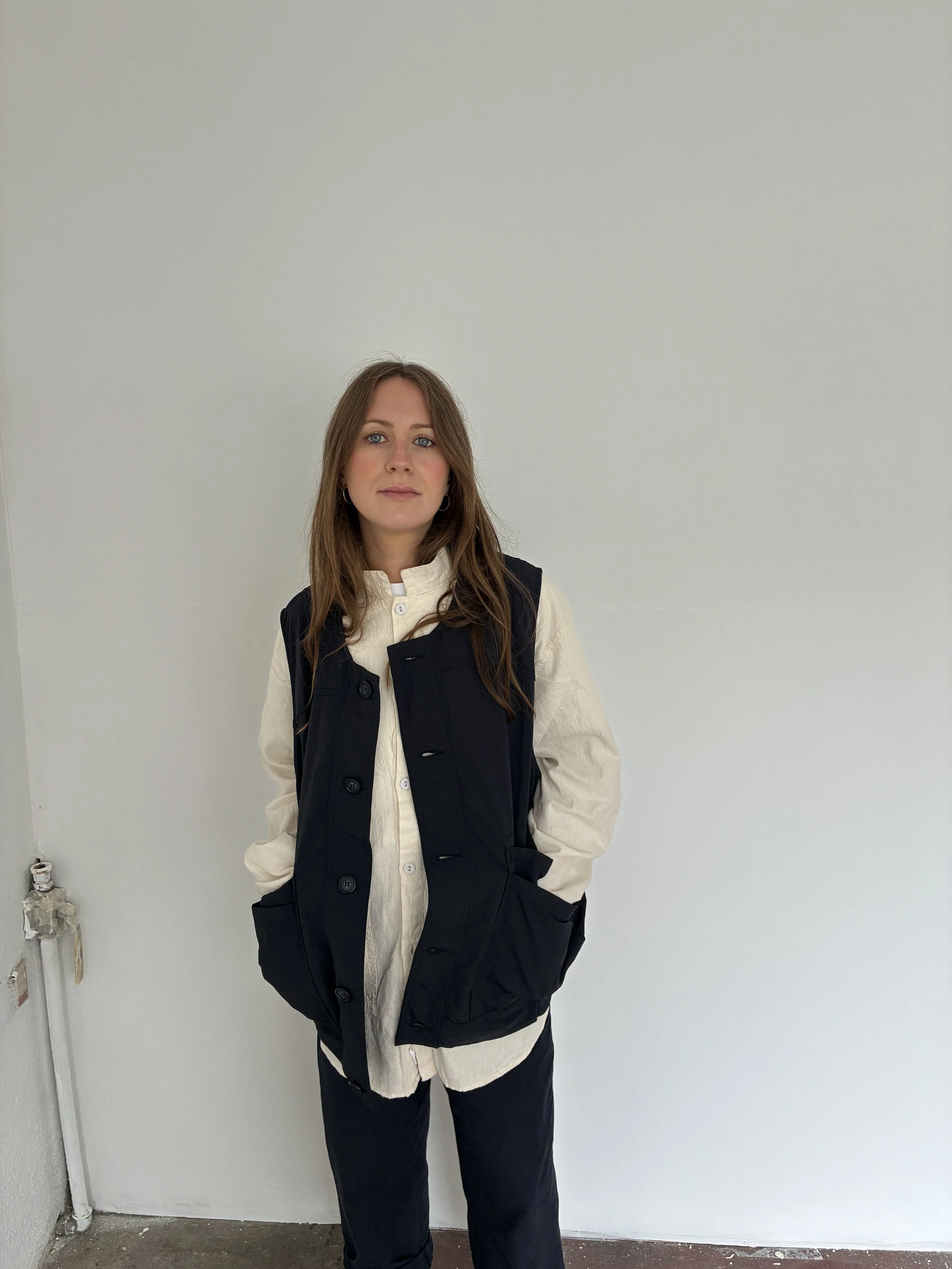Woman wearing Navy Sassafras Overgrown Hiker Vest