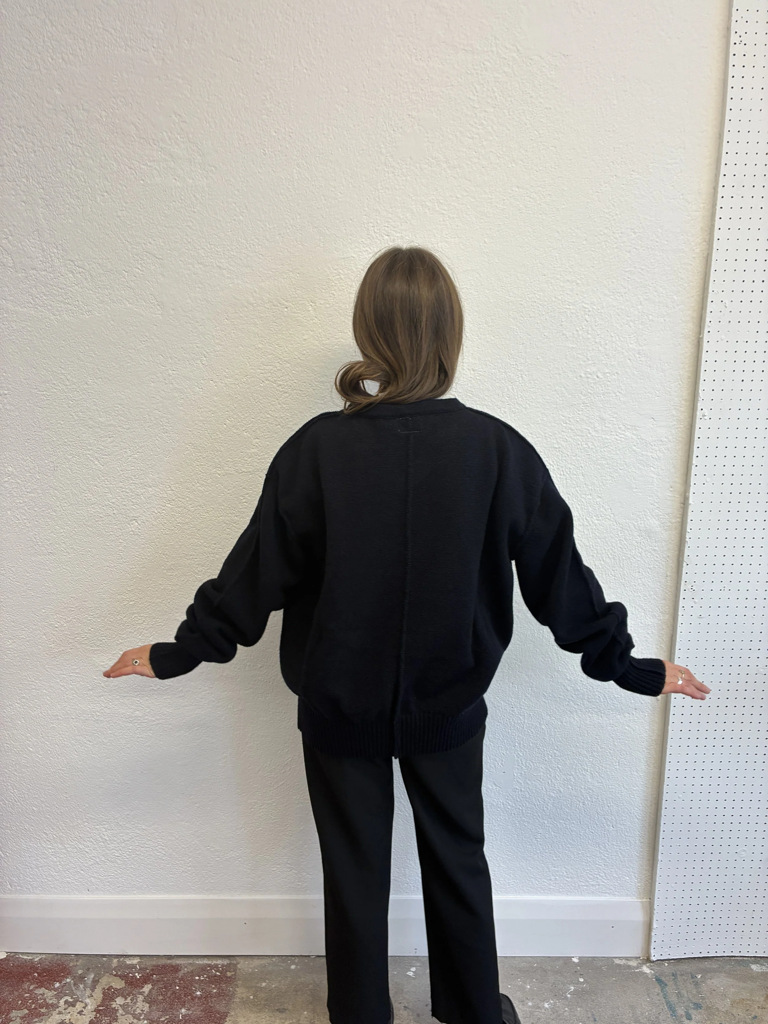 Back of Woman wearing the Navy Tender Co Type 719 Butterfly Jumper