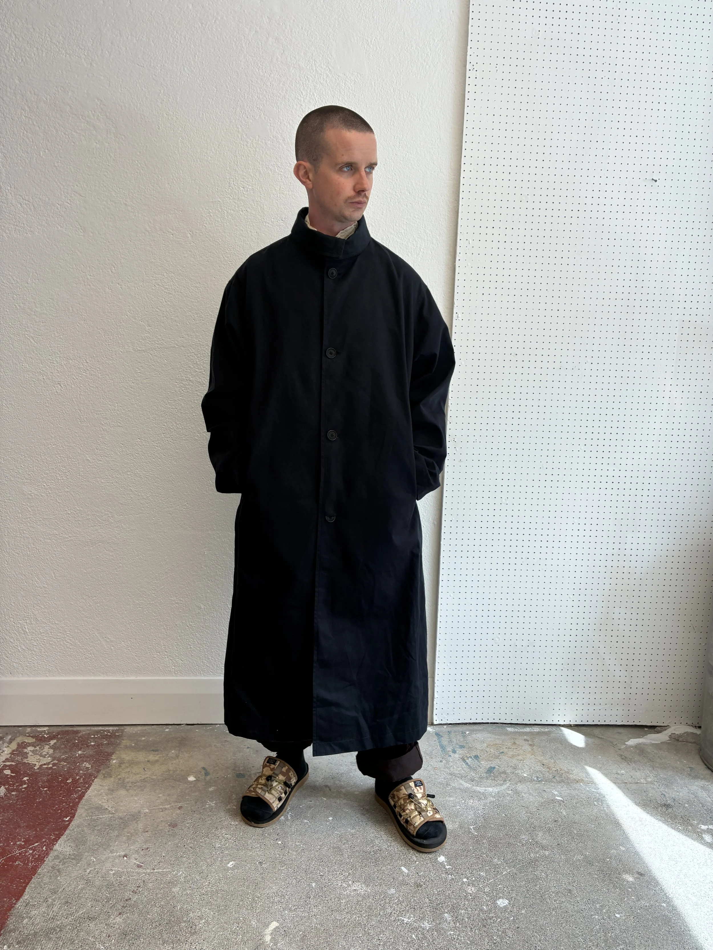 Man wearing Navy De Dam Foundation Cotton Gabardine Trench Coat