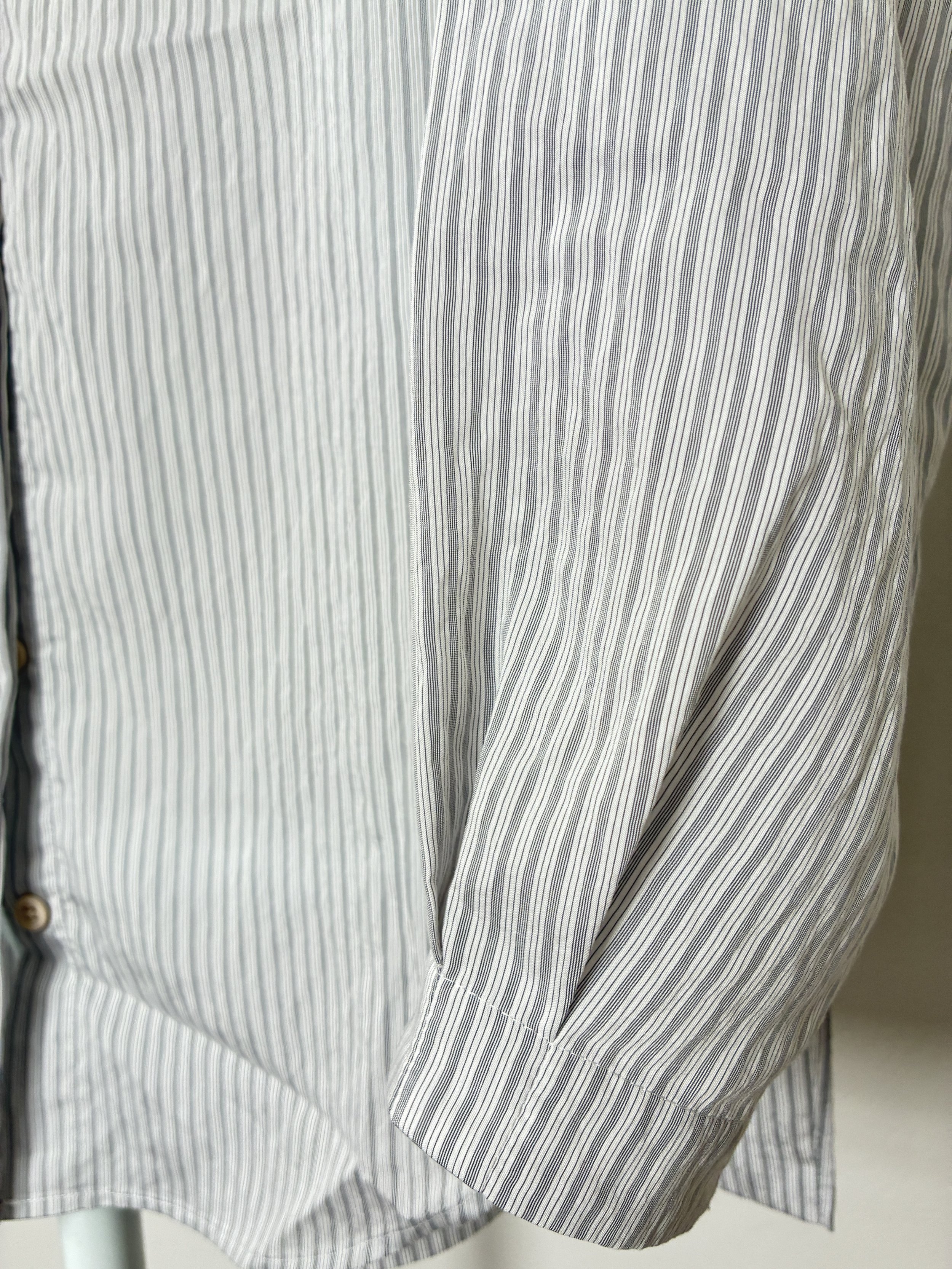 Closeup of plated cuff detail of 1st PAT-RN Woman Modula Shirt in Fine Stripes