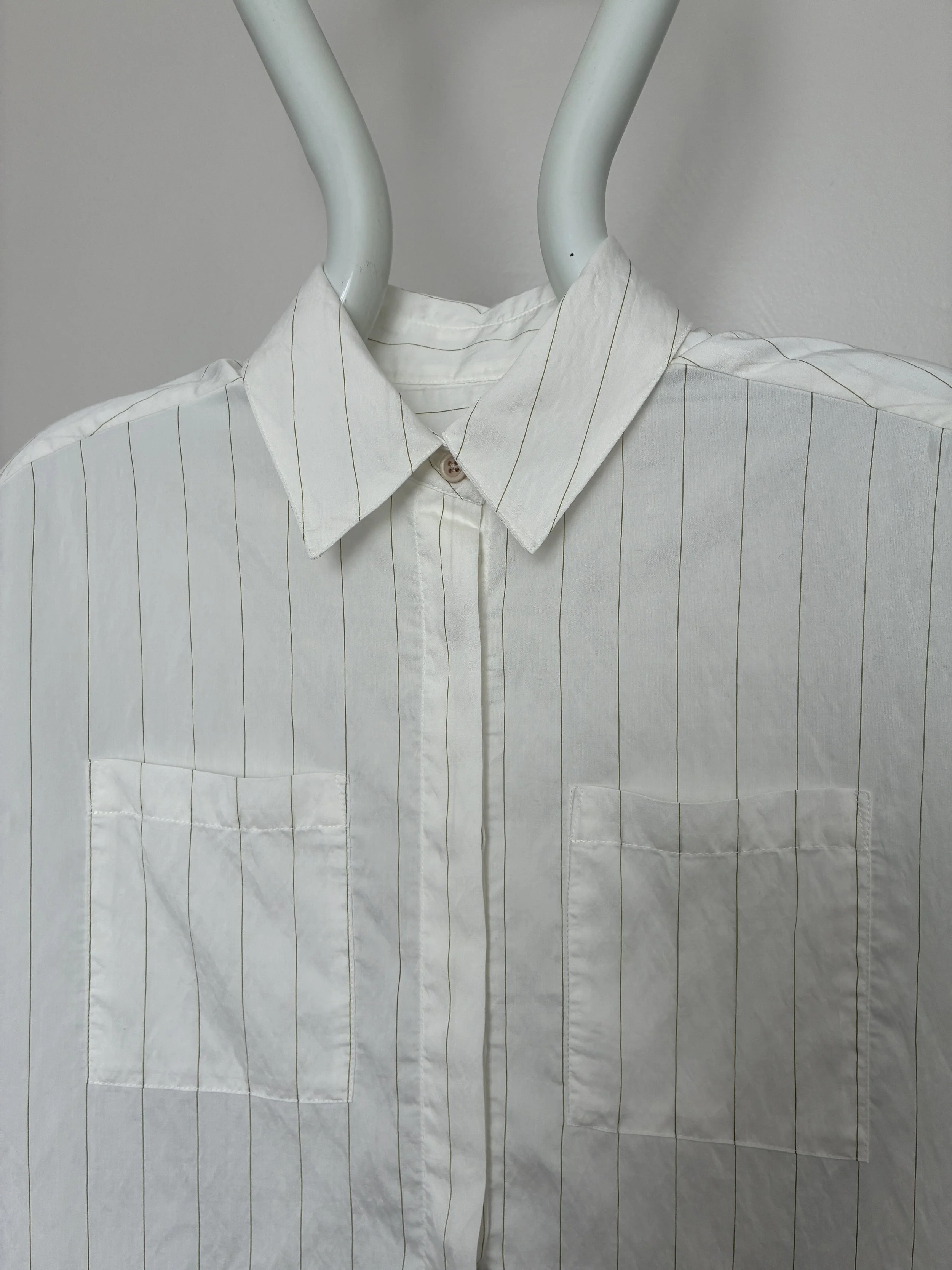 Close up of Mannequin wearing 1st PAT-RN Woman Modula Shirt in Tailored Stripes