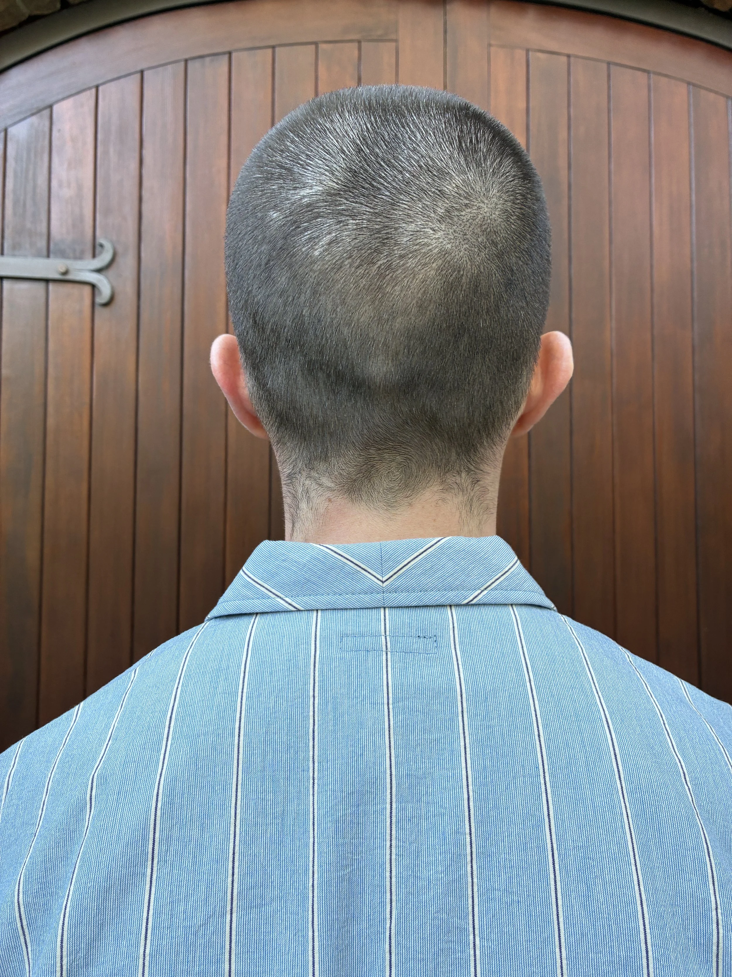 Close up of back of man wearing Frank Leder Japanese Cotton Blue Striped Shirt