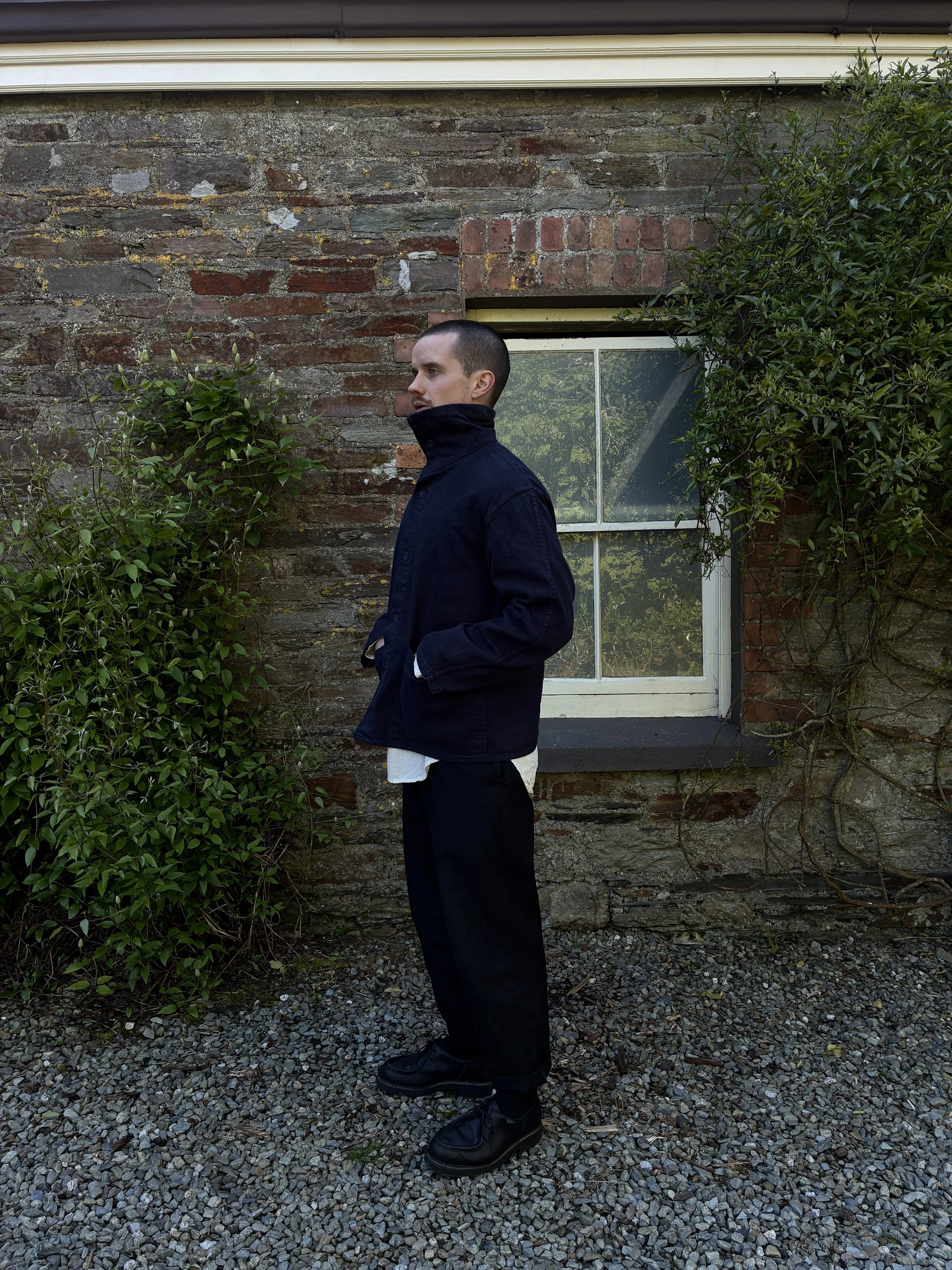 Man wearing Tender 931 Scout Jacket in Hadal Blue