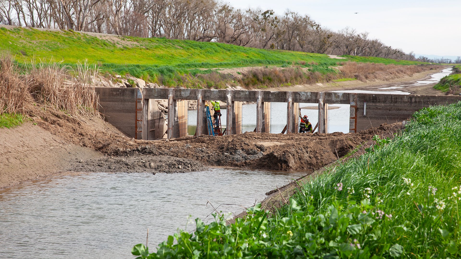 photo of construction workers building the canal