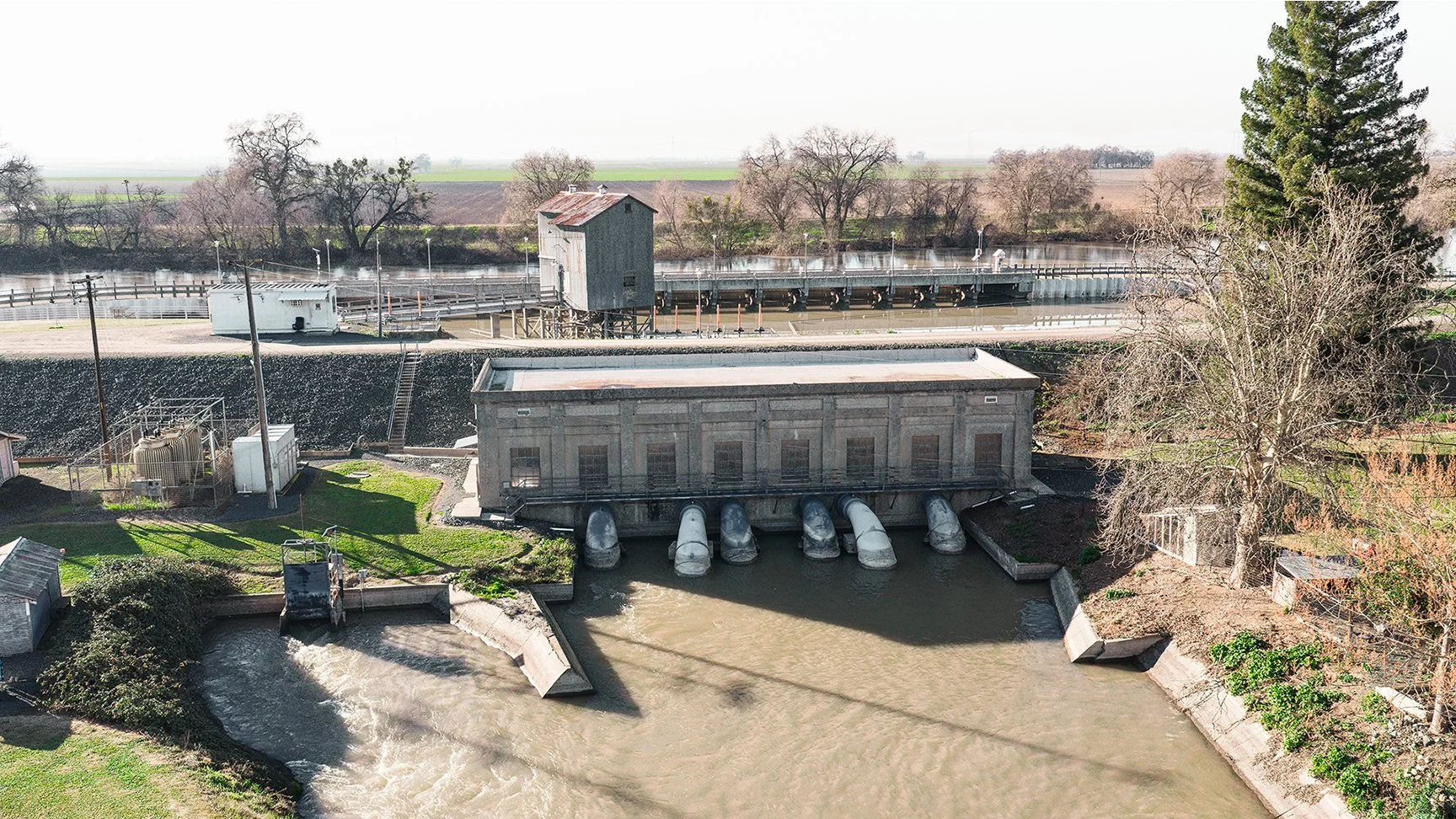 Exterior drone photo of tisdale pumping plant building