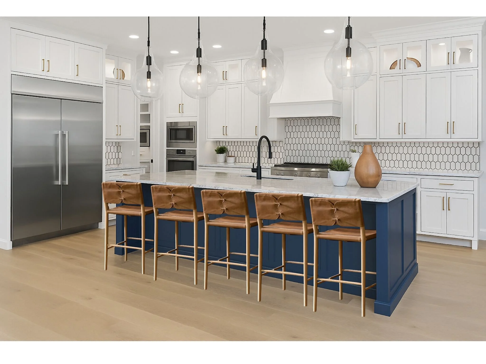 Modern East Bay kitchen design featuring white cabinetry with gold hardware, a navy blue island with leather barstools, marble countertops, stainless steel appliances, and geometric tile backsplash by Collected Interiors.