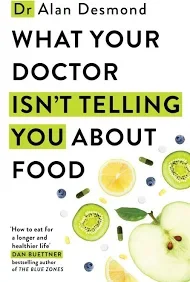 Book cover for 'What Your Doctor Isn't Telling You About Food' by Alan Desmond, featuring images of kiwi slices, lemon slices, blueberries, and green leaves.