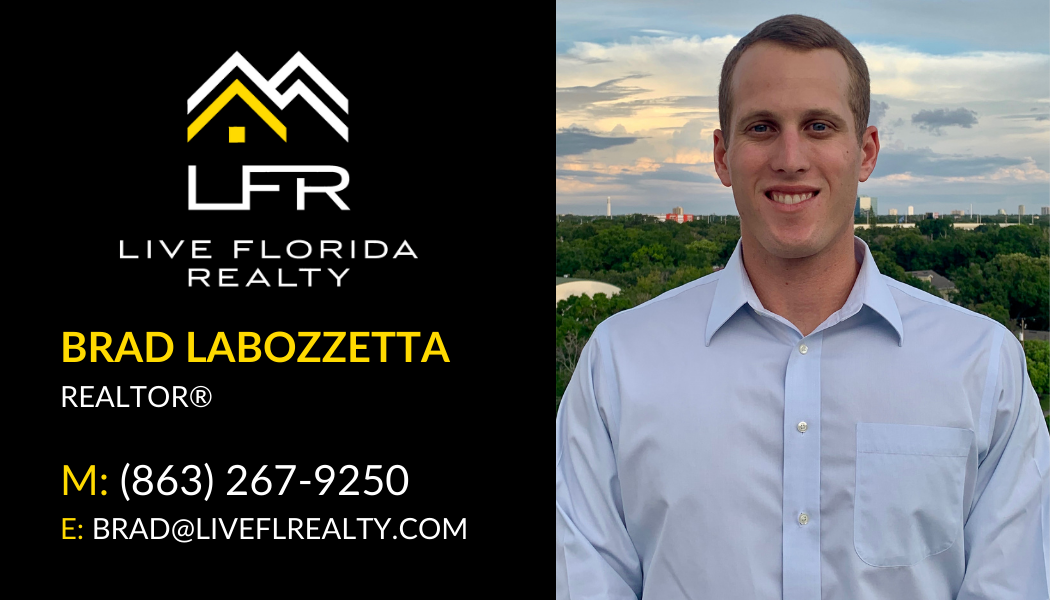 Business card for Brad Labozzetta, a realtor with Live Florida Realty, featuring contact information and a professional headshot of Brad in a light blue shirt with a cityscape background.