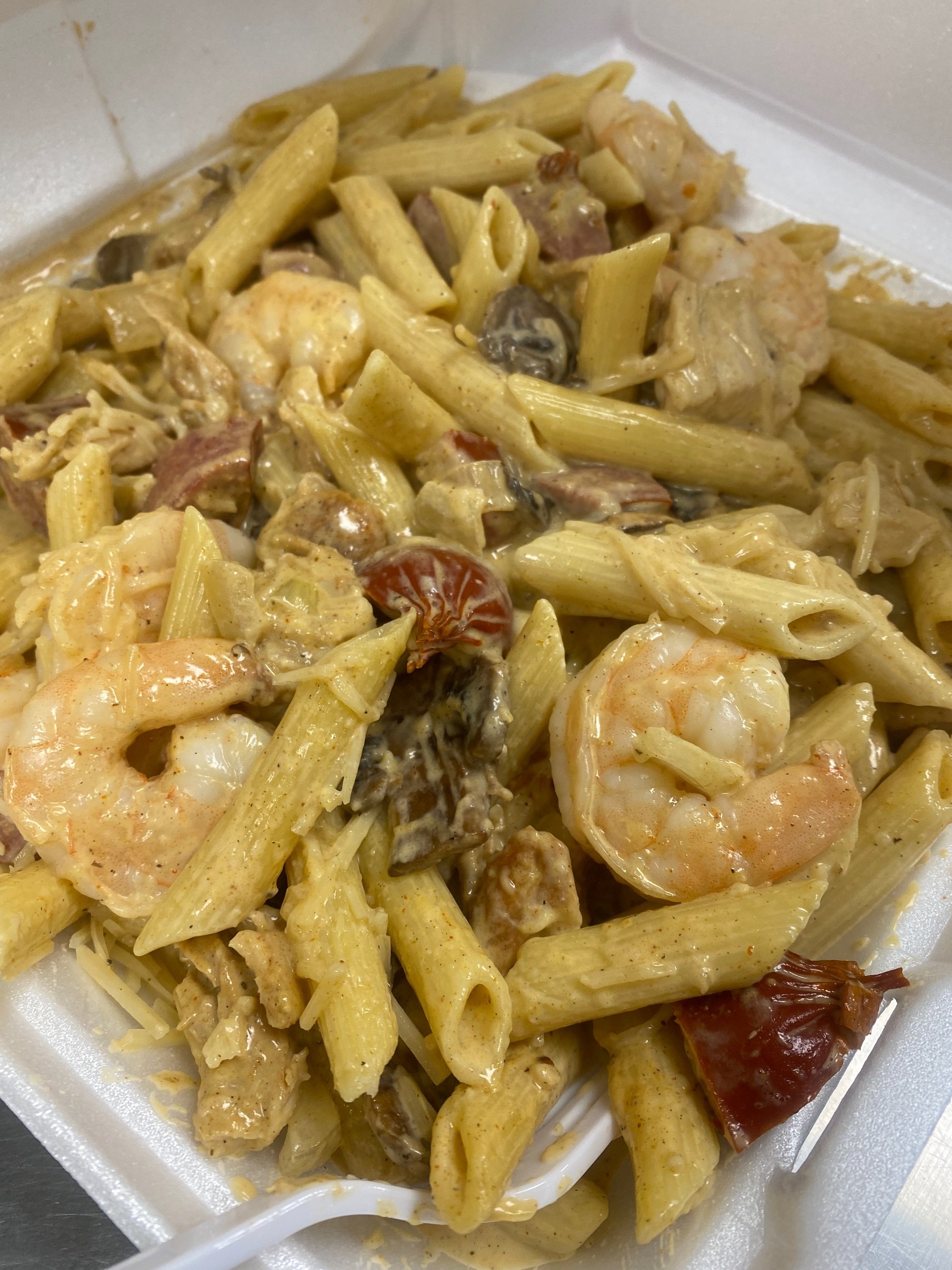 Cajun Pasta with Sausage, Shrimp, Chicken , Onion, & Mushroom