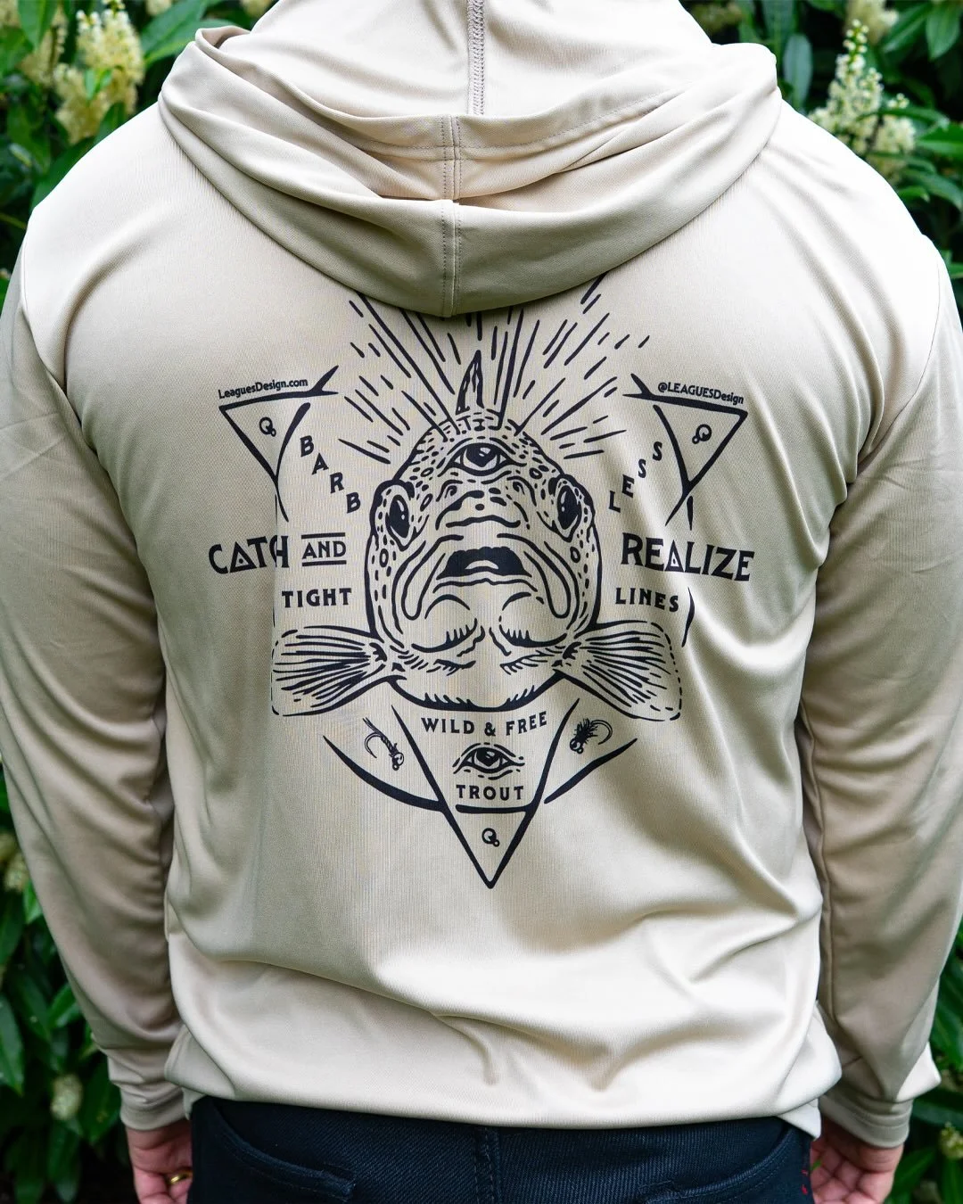 Find enlightenment through catch &amp; release fly fishing with this UPF 50+ hoodie 👁️ featuring an original illustration by LEAGUES Design Studio. This hoodie does not have thumb holes or loops. Model shown is 5&rsquo;6&rdquo; and weighs 170lbs, an