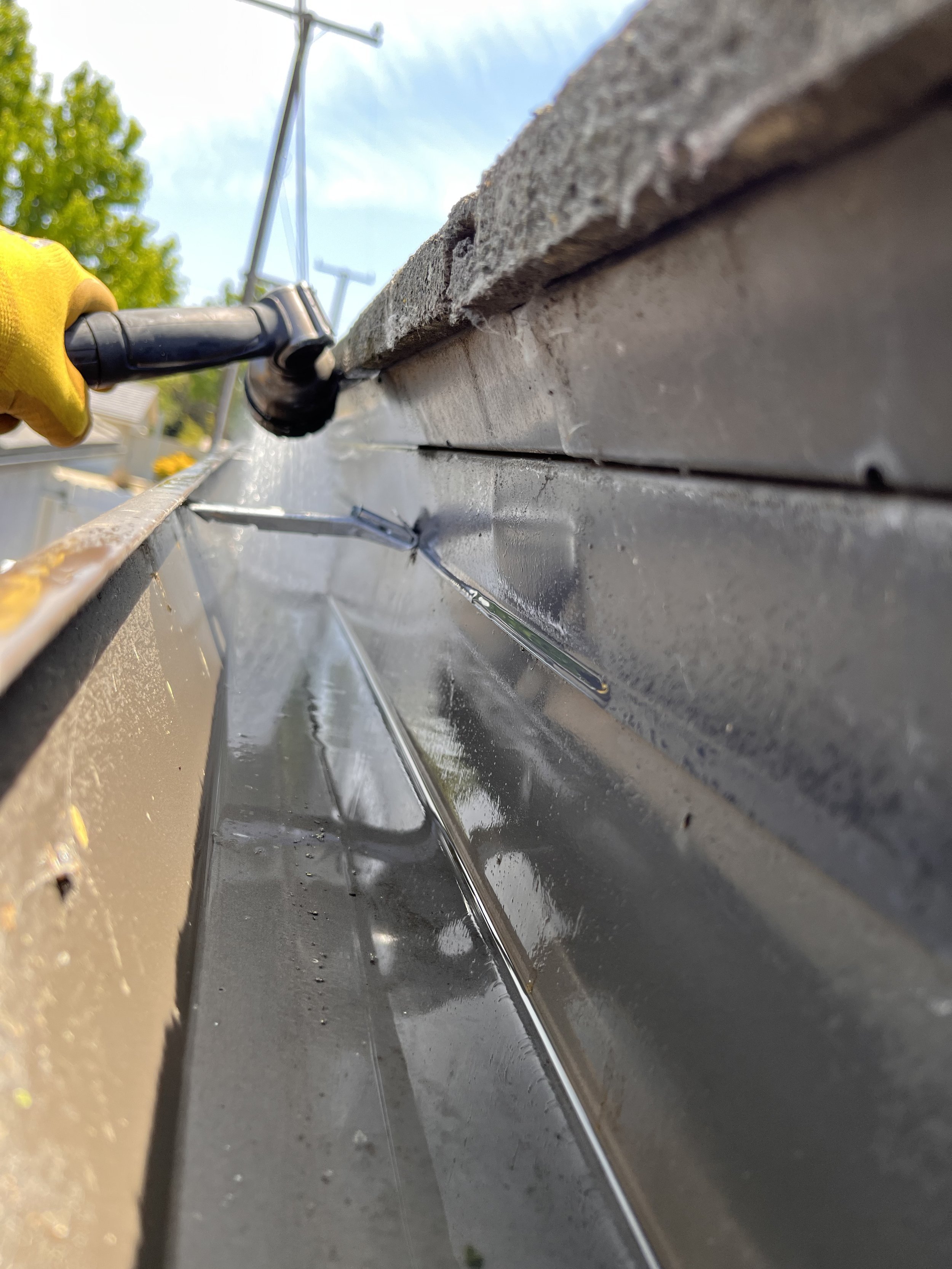 After photo showing a clean, free-flowing gutter following a professional gutter cleaning service in Long Beach, California. Guru Solar Cleaning safely removed leaves, debris, and buildup to restore proper drainage and protect the home from water dam