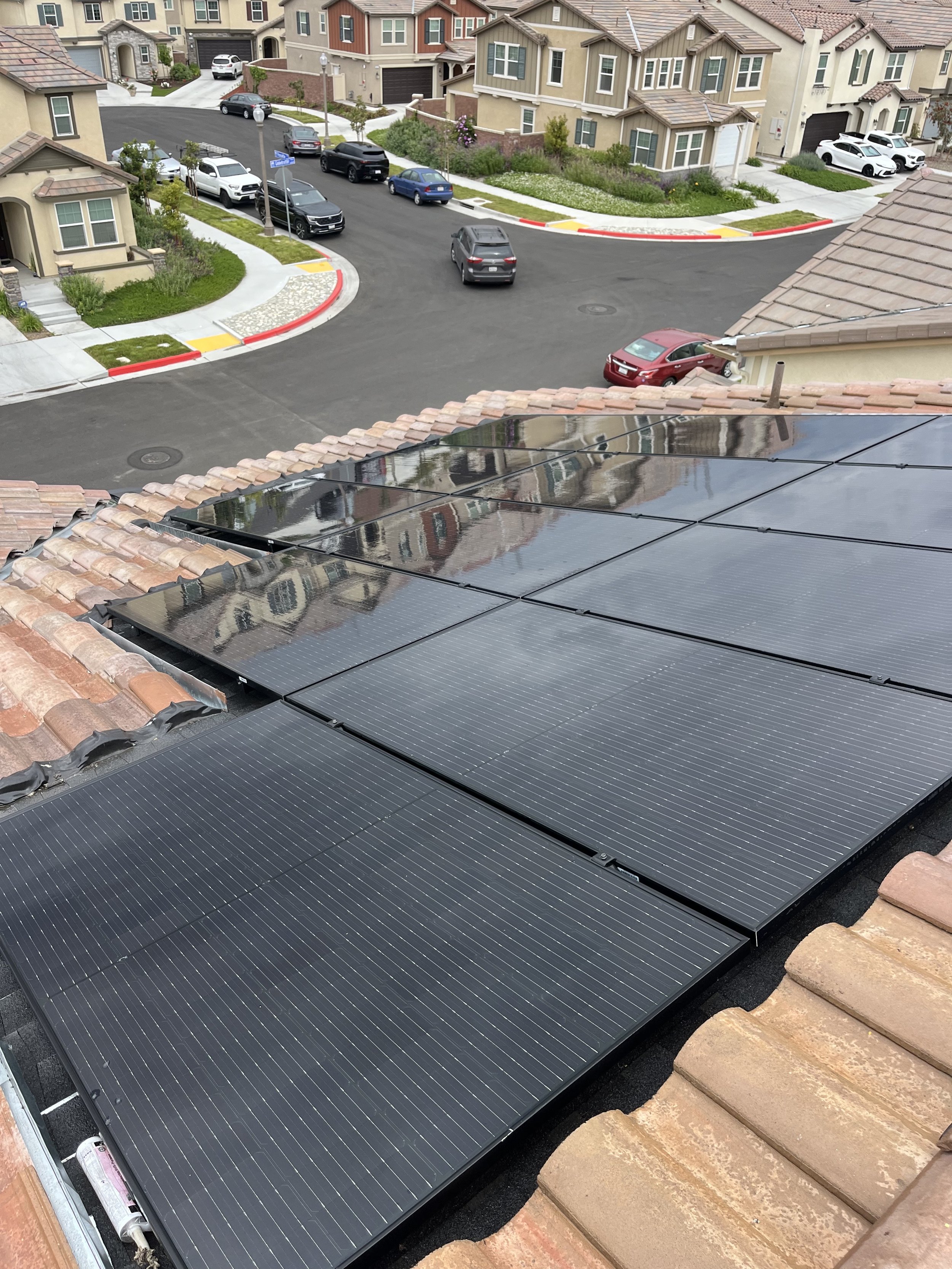 Solar panels in Chino, California fully restored after a detailed professional cleaning by Guru Solar Cleaning. Layers of bee pollen, dust, and debris were removed using purified water and soft-brush equipment, improving solar energy efficiency, prot