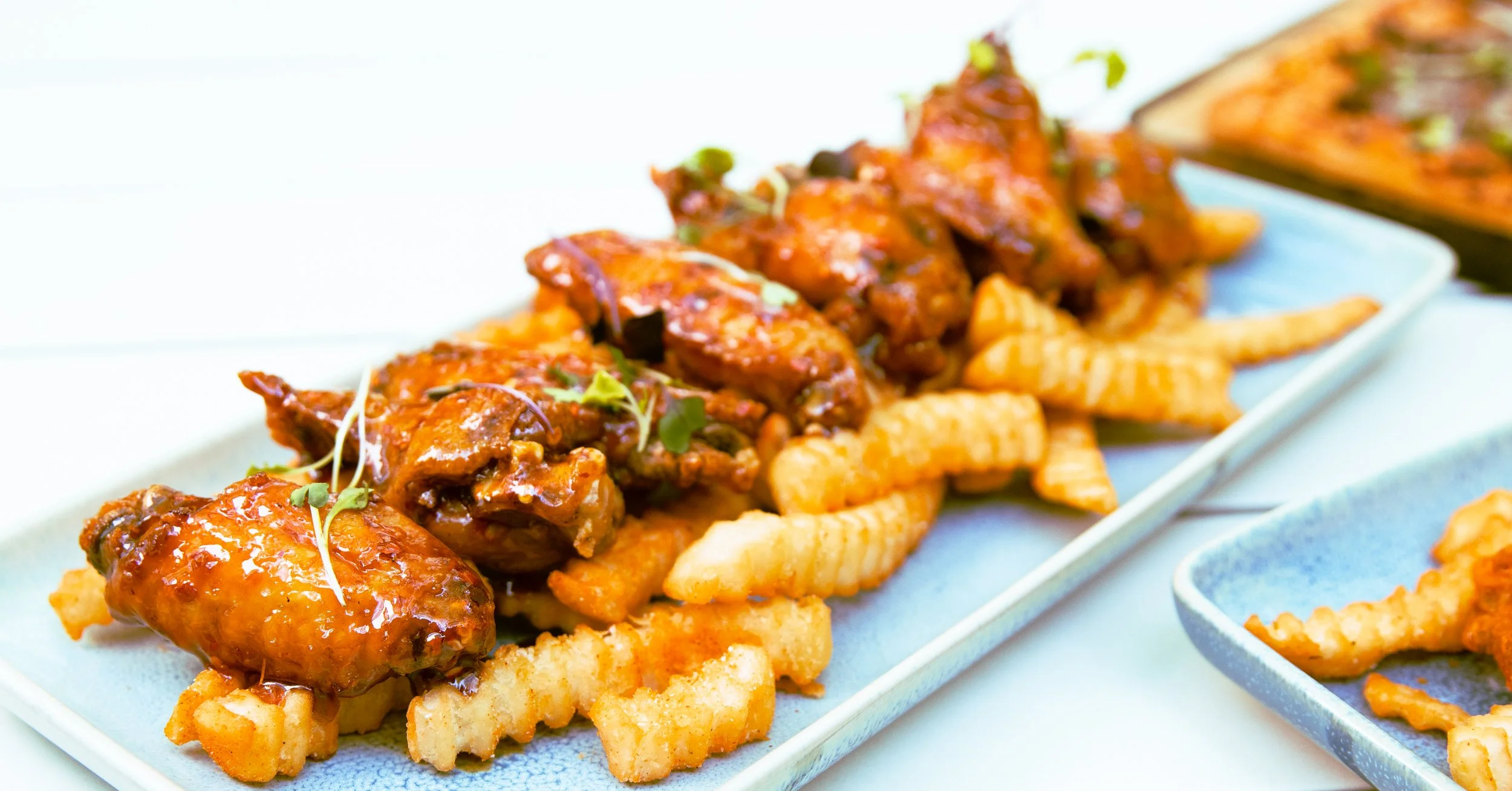 Crispy Wings glazed in Sweet and Spicy Sriracha