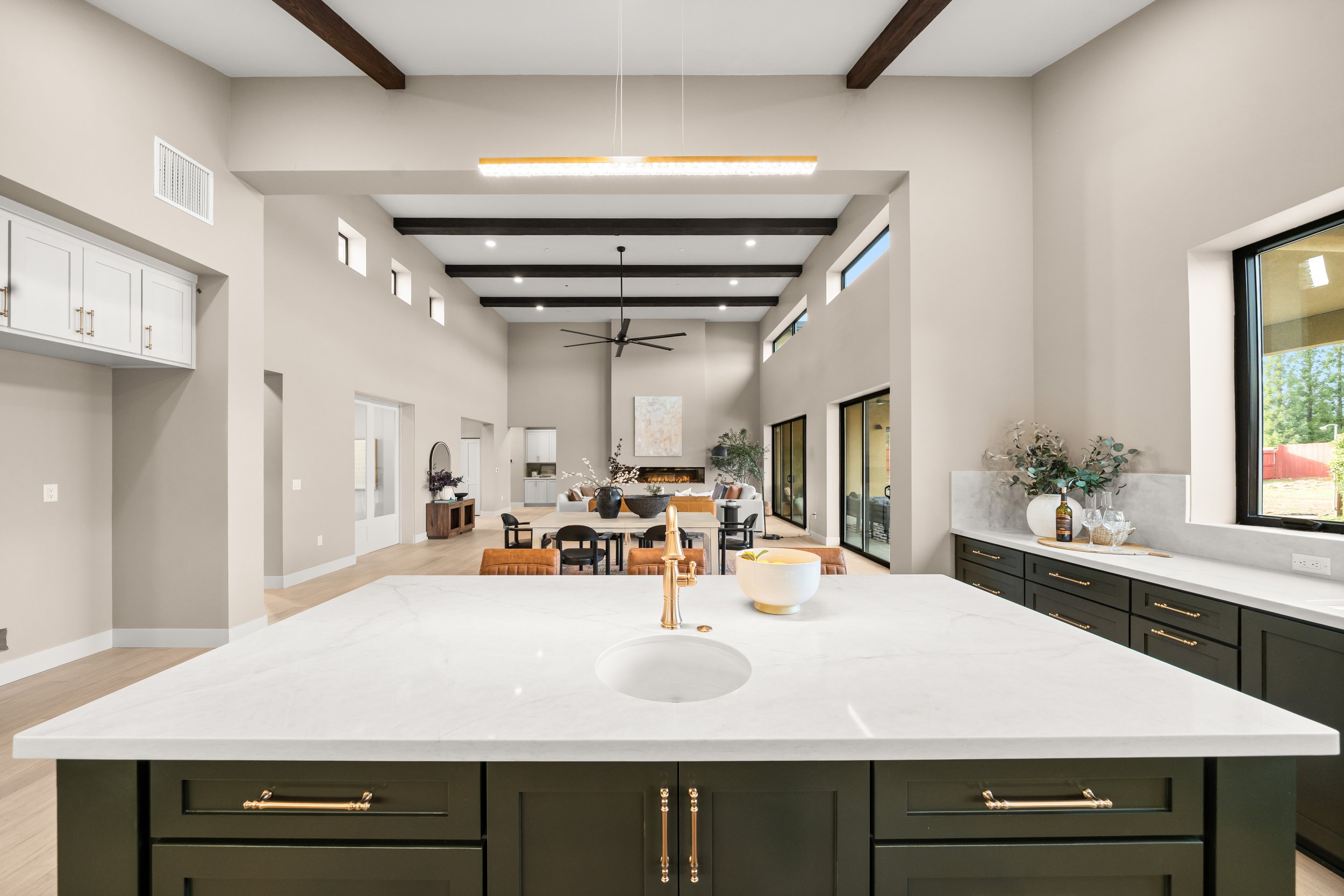5093 Malibu Drive, Paradise, CA Kitchen Quartz "Taj" Countertop Island & Champagne Finishes. Delta & Kohler Faucets and Sinks.