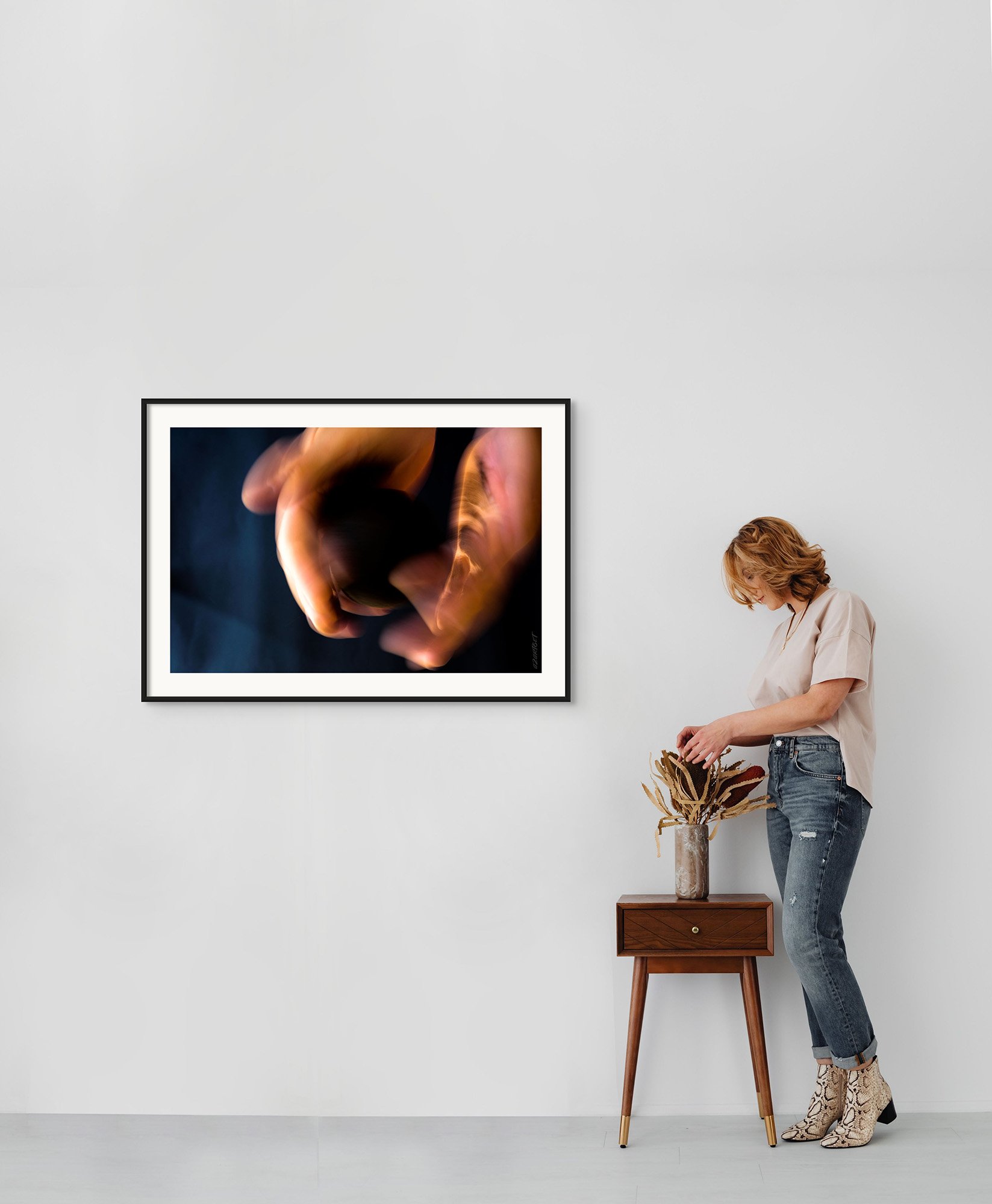 "Grasp of War - Engulfment" by Azartget displayed in an interior setting.