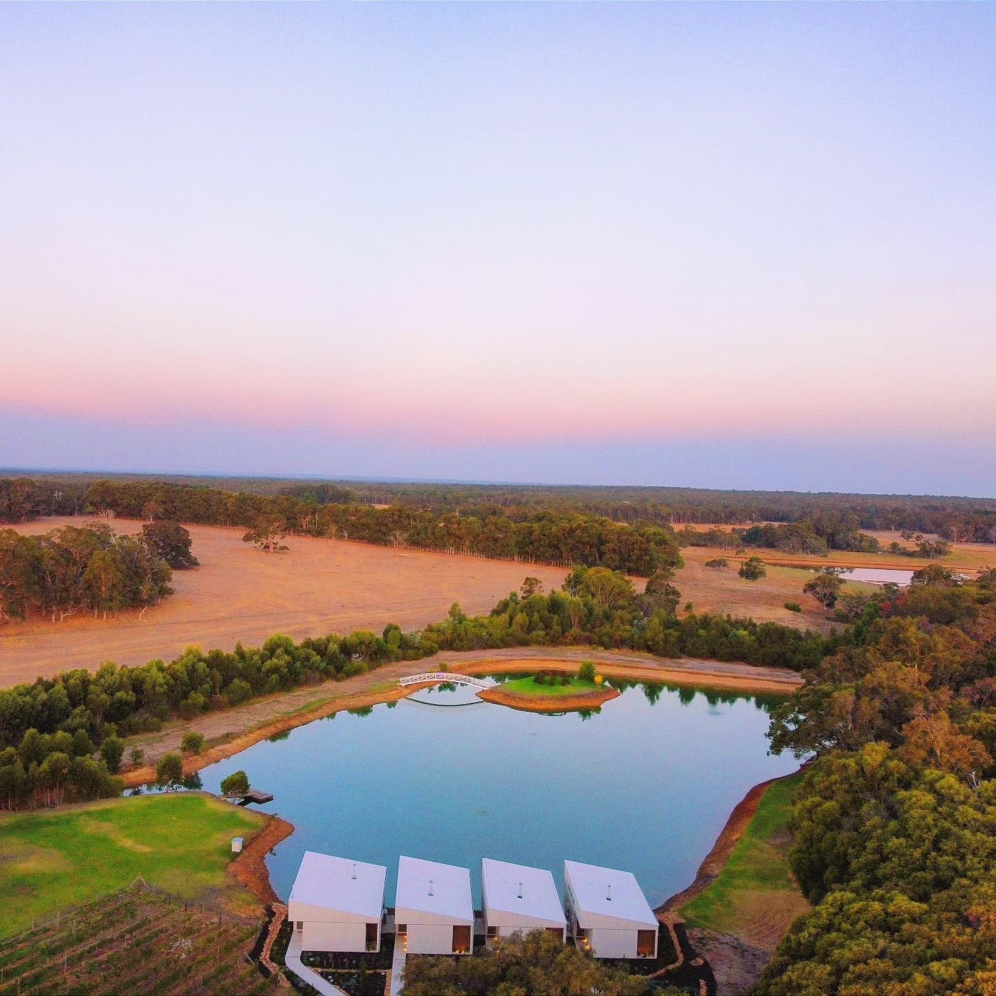 No need for TV when your accommodation view looks like this! Magic time at the villas✨ Last light casting beautiful colours across the sky and reflections on the lake. 

#holidayaccommodation #EdgeLuxuryVillas #margaretriveraccommodation #Yallingup #