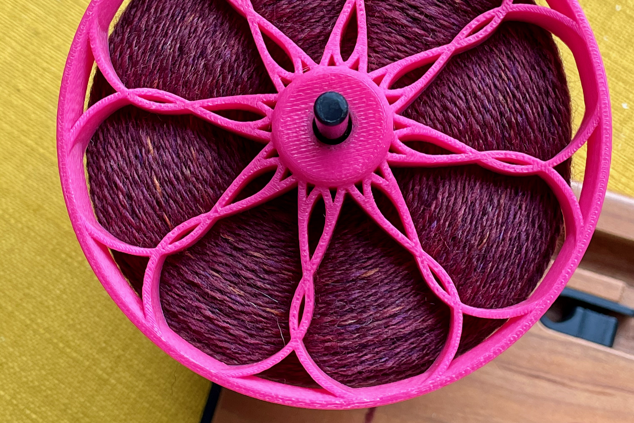 handspun-yarn-pink-bobbin.png