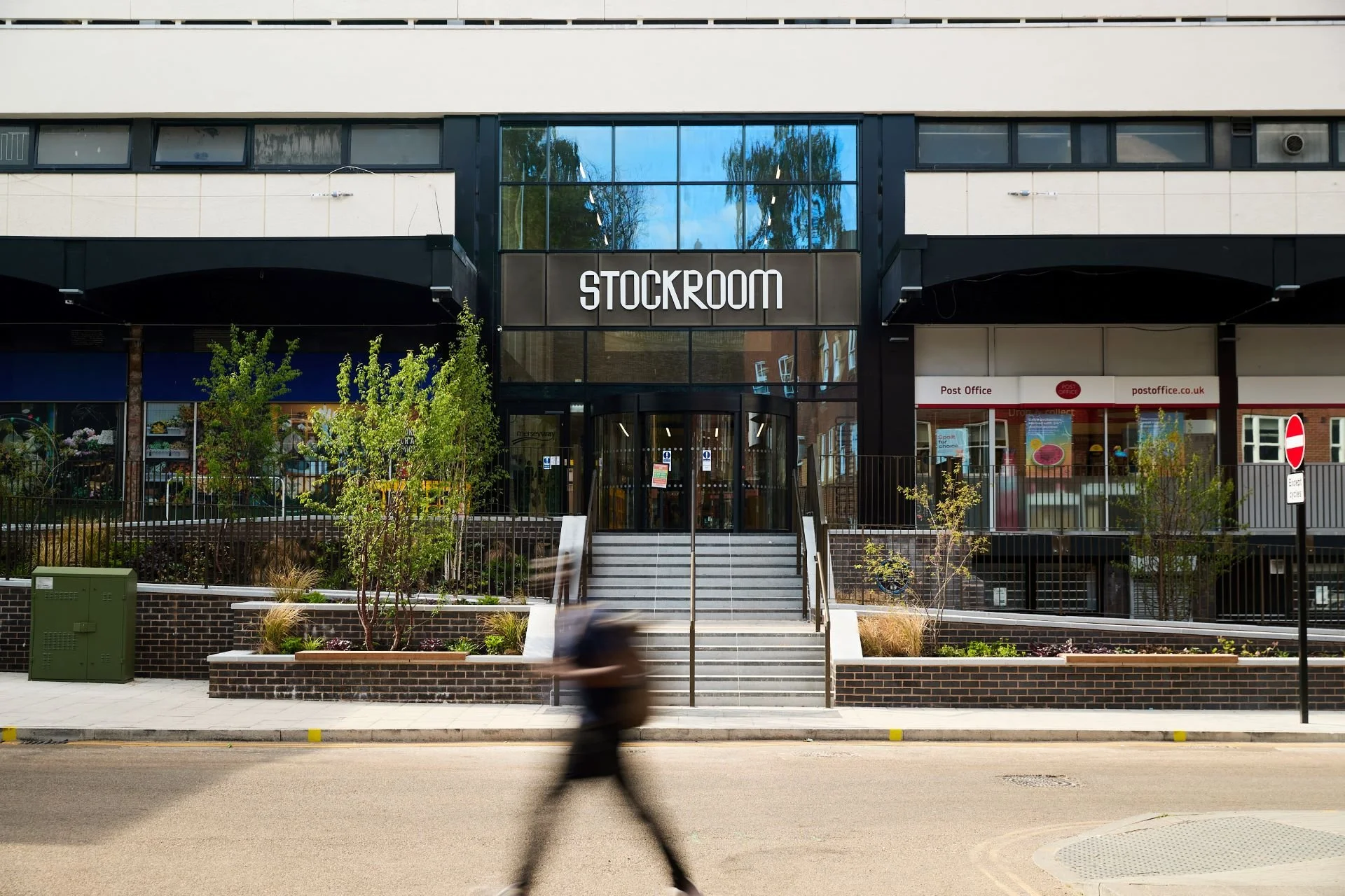 Stockroom building in Greater Manchester showcasing a refurbished town centre asset with modern entrance and landscaping