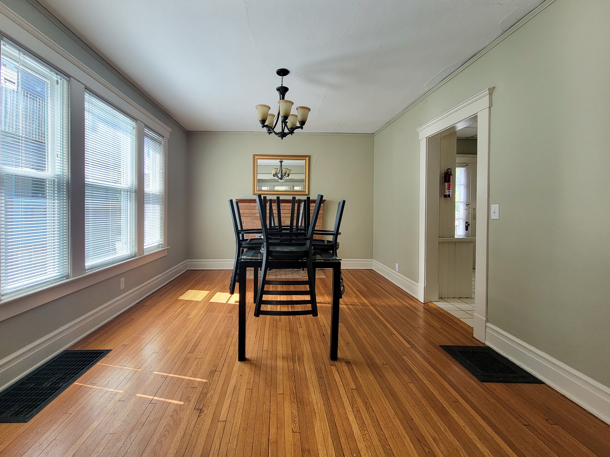 dining-room-hardwood-floors-chandelier.jpg