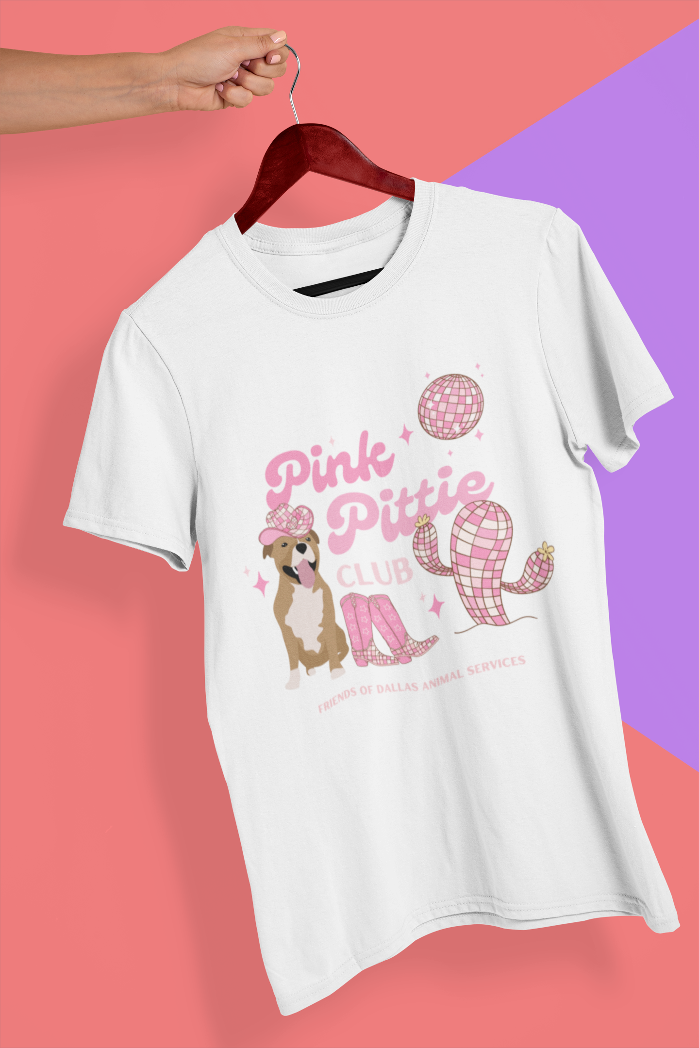 mockup-of-a-hand-holding-a-t-shirt-in-a-colorful-background-26735.png
