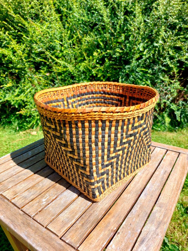 dyed black cedar bark woven basket
