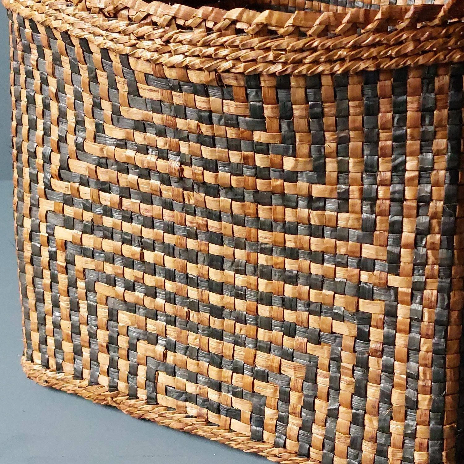 Close up of the side of a cedar bark basket