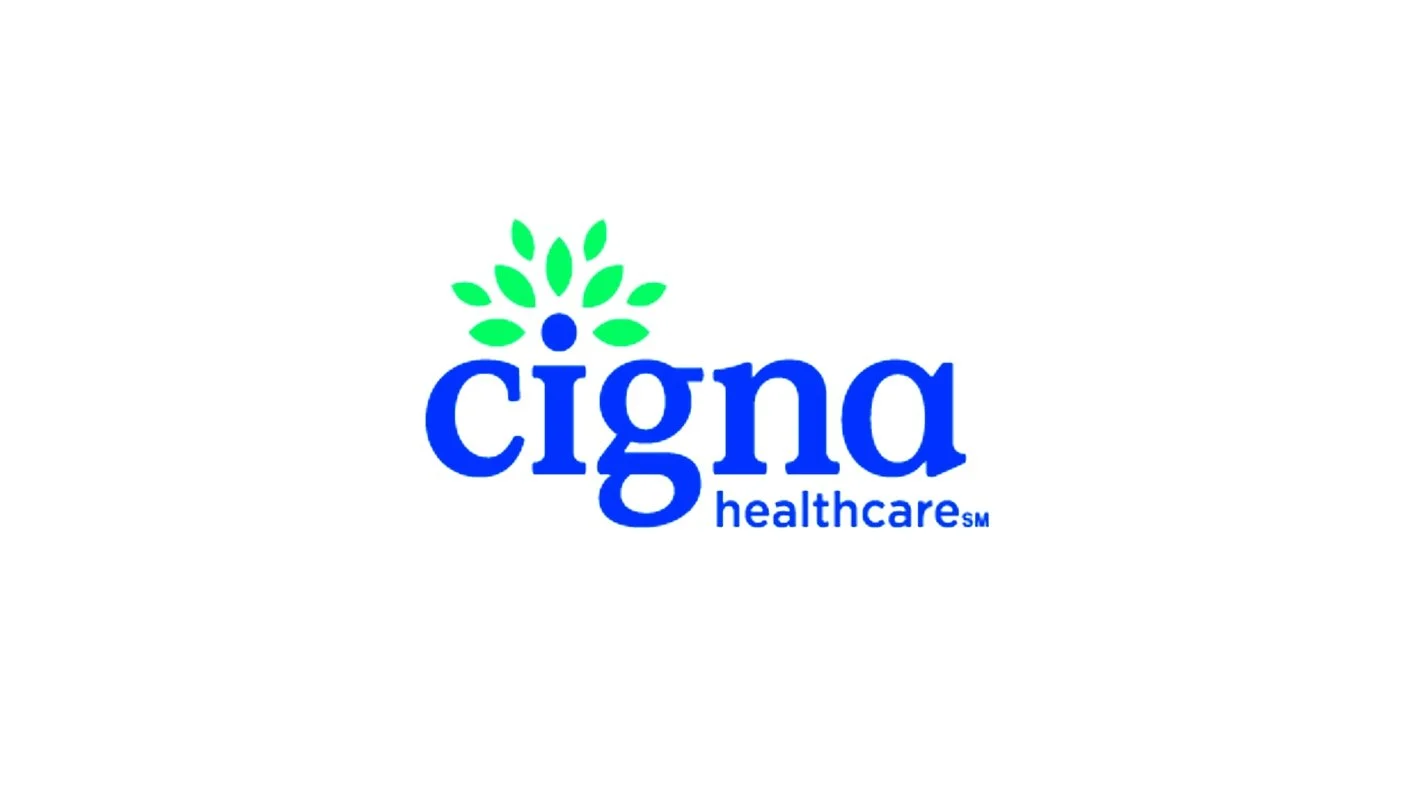 Cigna Healthcare logo with blue text and green leaf design.