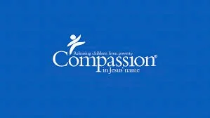 Logo of Compassion International with tagline "Releasing children from poverty in Jesus' name" on a blue background.