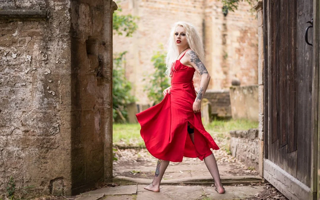 woman swish red dress