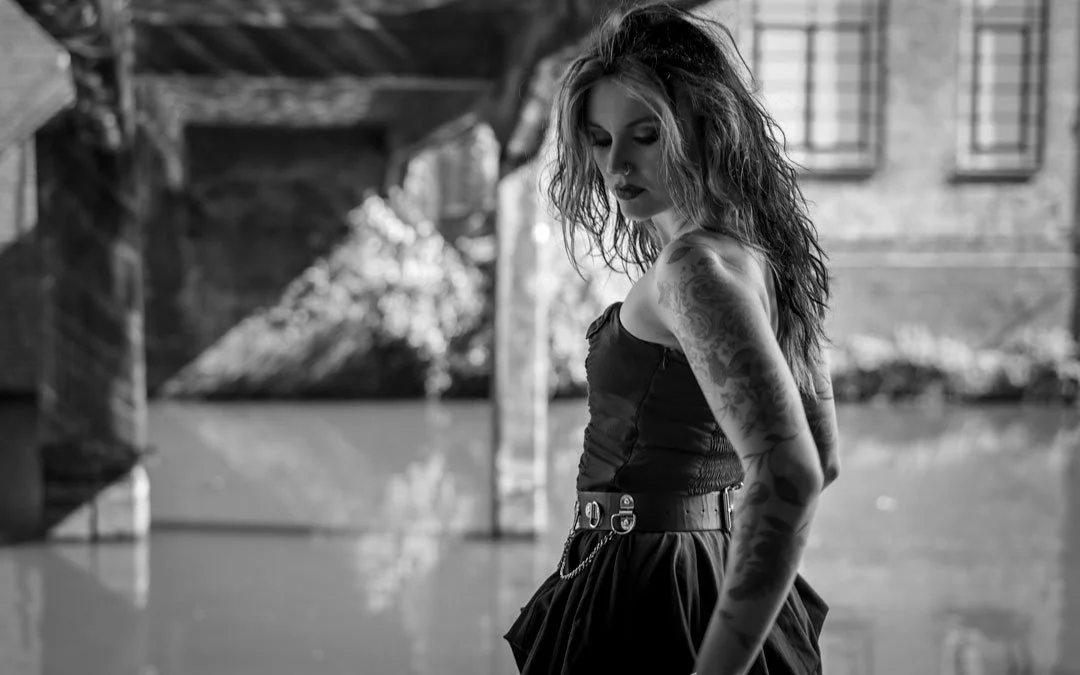woman under bridge moody