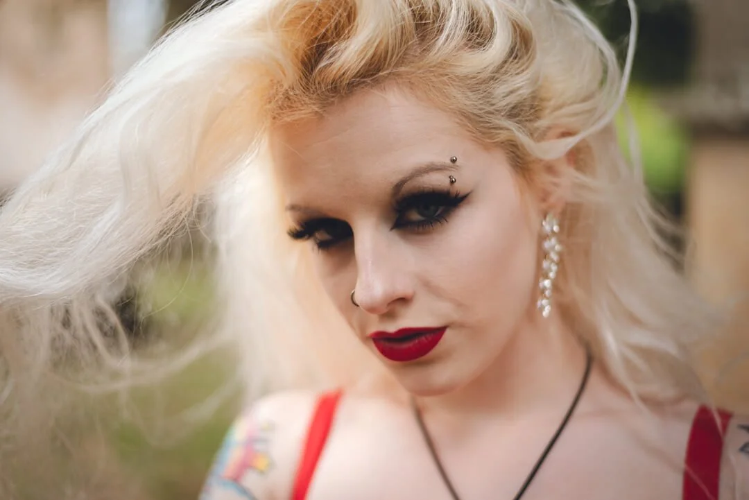 woman portrait red dress eyes