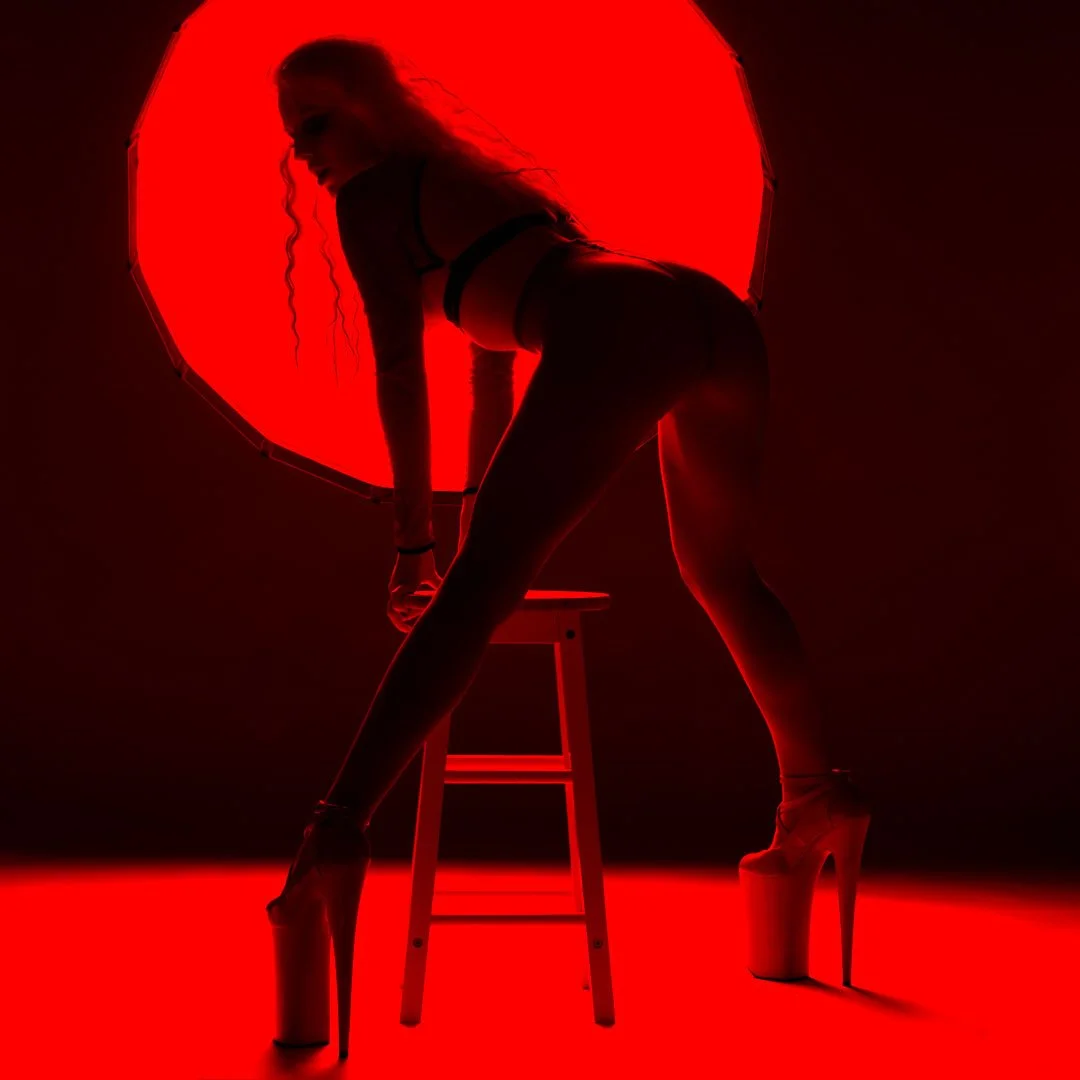 woman red sun pose
